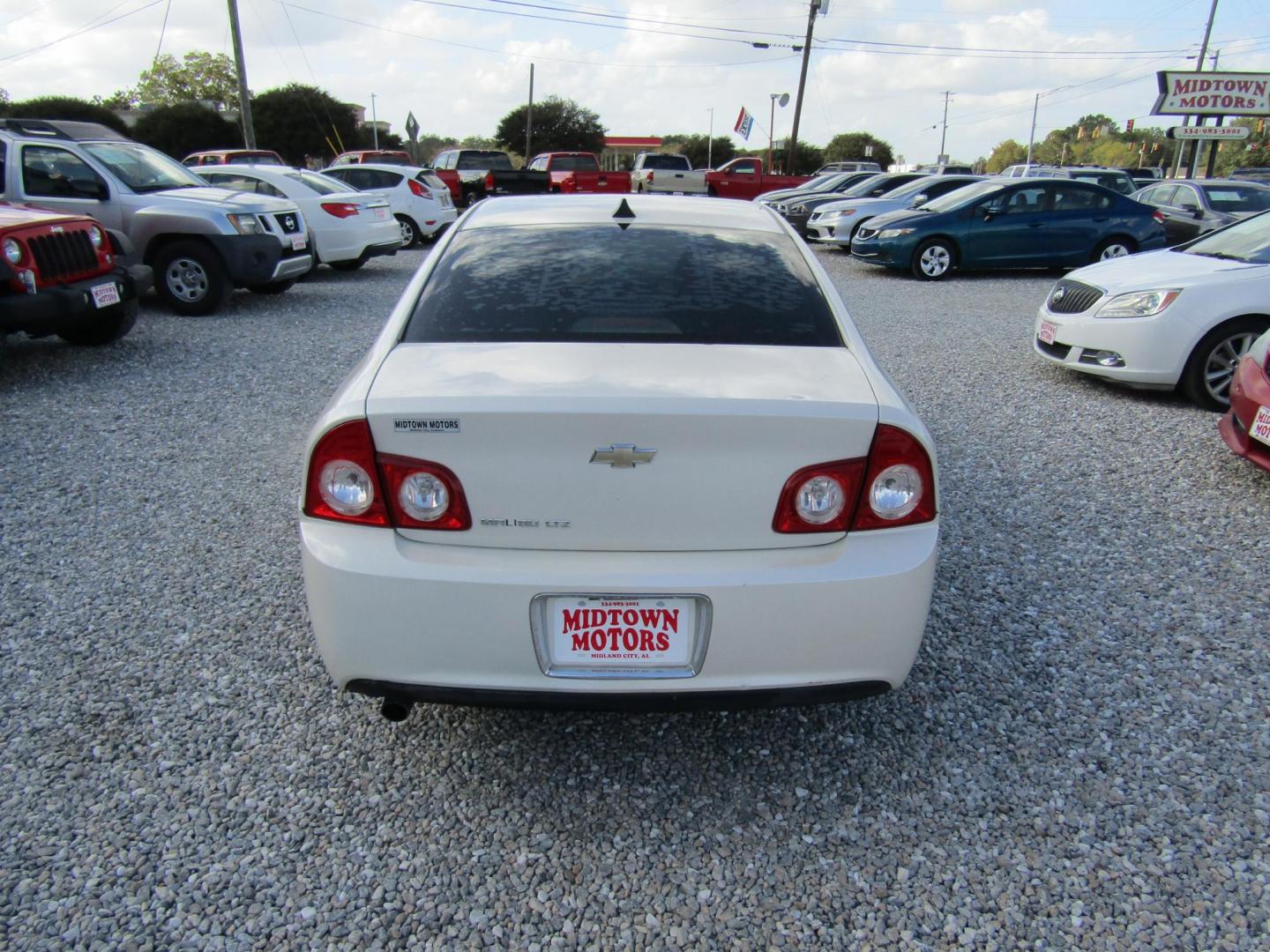 2012 White Chevrolet Malibu 1LTZ (1G1ZE5E00CF) with an 2.4L L4 DOHC 16V engine, Automatic transmission, located at 15016 S Hwy 231, Midland City, AL, 36350, (334) 983-3001, 31.306210, -85.495277 - Photo#6