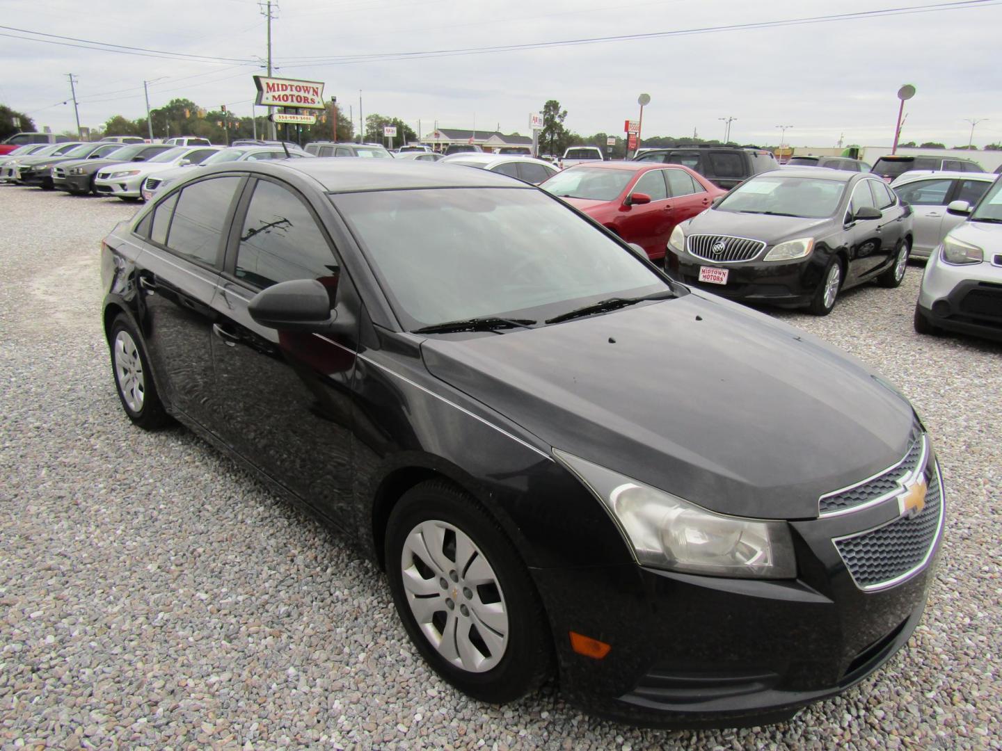 2013 Black Chevrolet Cruze LS Auto (1G1PA5SHXD7) with an 1.8L L4 DOHC 16V FFV engine, Automatic transmission, located at 15016 S Hwy 231, Midland City, AL, 36350, (334) 983-3001, 31.306210, -85.495277 - Photo#0