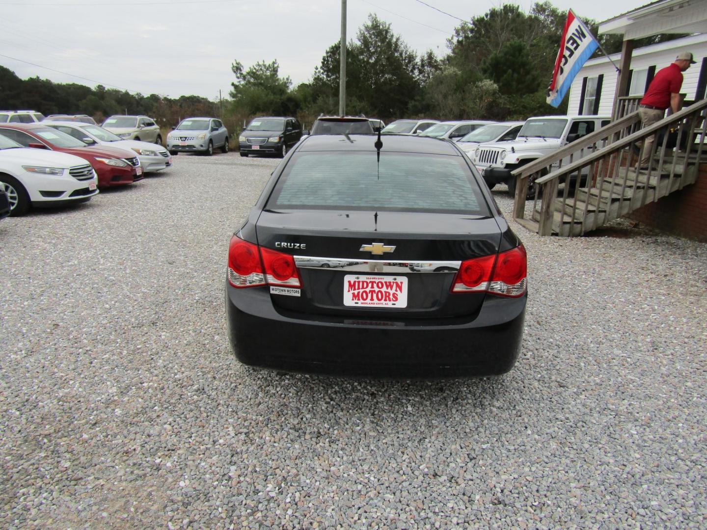 2013 Black Chevrolet Cruze LS Auto (1G1PA5SHXD7) with an 1.8L L4 DOHC 16V FFV engine, Automatic transmission, located at 15016 S Hwy 231, Midland City, AL, 36350, (334) 983-3001, 31.306210, -85.495277 - Photo#6