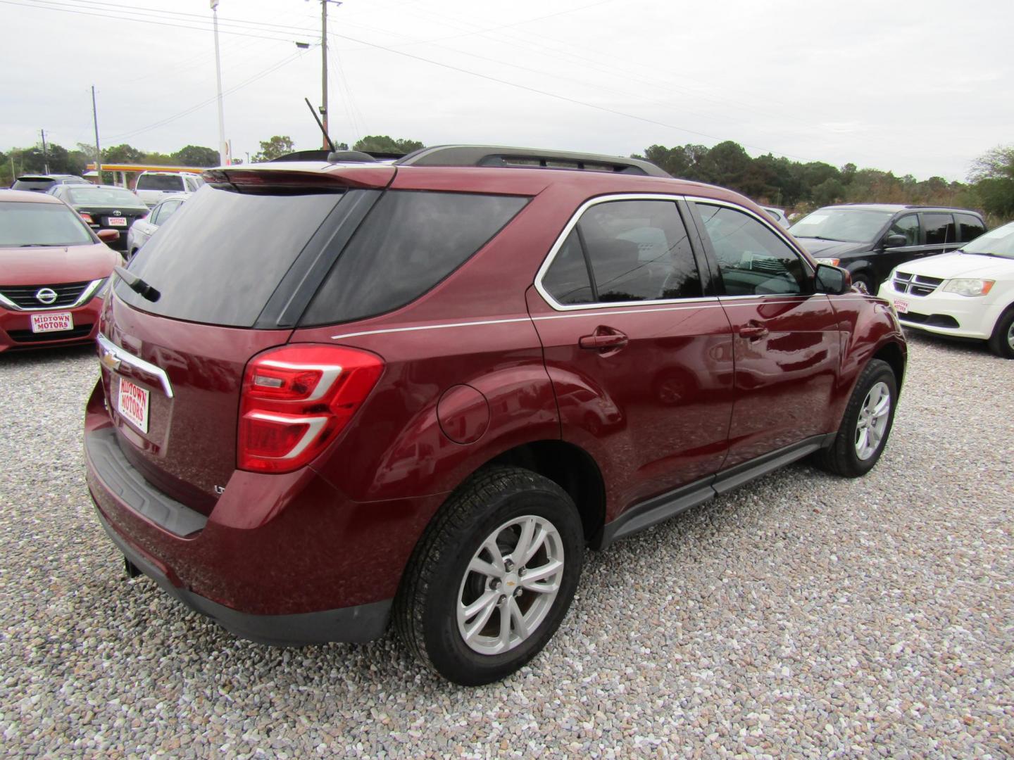 2017 Burgandy Chevrolet Equinox LT 2WD (2GNALCEK8H6) with an 2.4L L4 DOHC 16V FFV engine, Automatic transmission, located at 15016 S Hwy 231, Midland City, AL, 36350, (334) 983-3001, 31.306210, -85.495277 - Photo#6