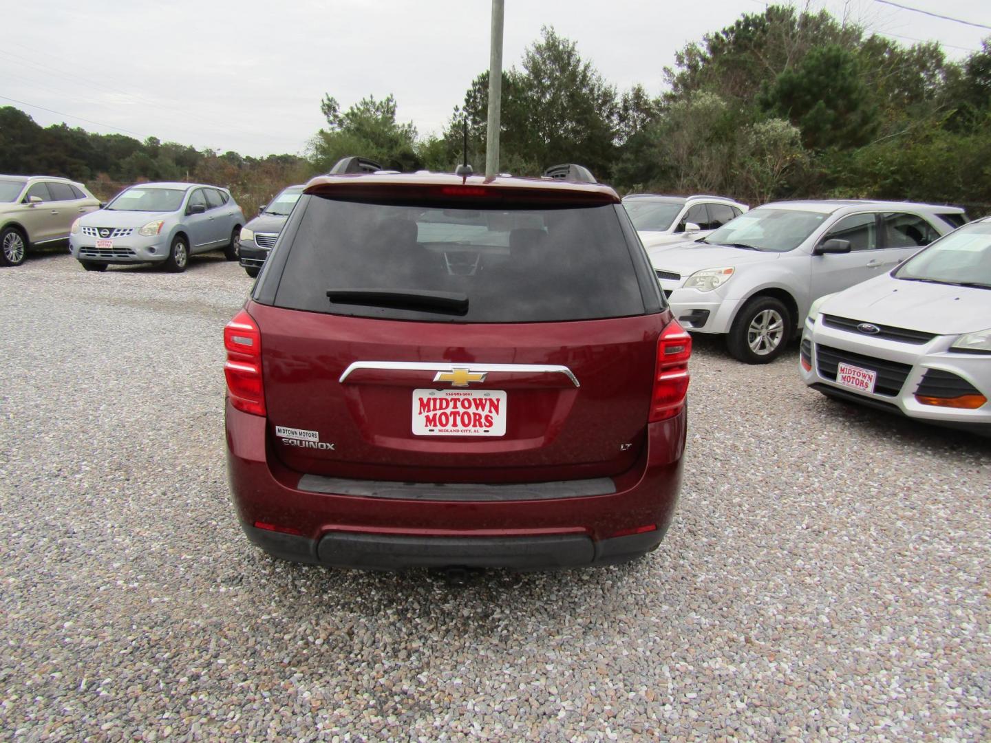 2017 Burgandy Chevrolet Equinox LT 2WD (2GNALCEK8H6) with an 2.4L L4 DOHC 16V FFV engine, Automatic transmission, located at 15016 S Hwy 231, Midland City, AL, 36350, (334) 983-3001, 31.306210, -85.495277 - Photo#8