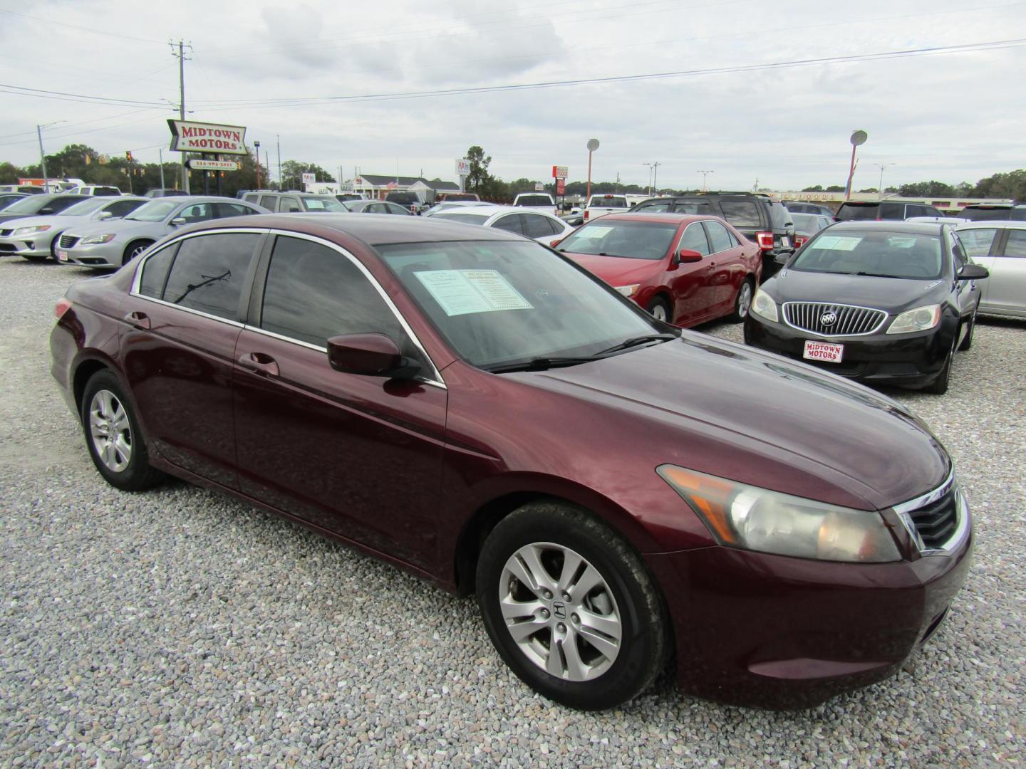 2009 Red Honda Accord LX-P Sedan AT (1HGCP26449A) with an 2.4L L4 DOHC 16V engine, Automatic transmission, located at 15016 S Hwy 231, Midland City, AL, 36350, (334) 983-3001, 31.306210, -85.495277 - Photo#0