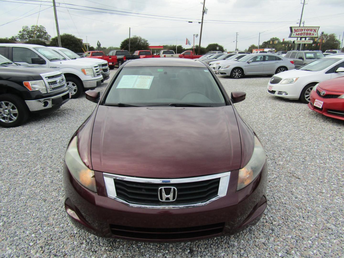 2009 Red Honda Accord LX-P Sedan AT (1HGCP26449A) with an 2.4L L4 DOHC 16V engine, Automatic transmission, located at 15016 S Hwy 231, Midland City, AL, 36350, (334) 983-3001, 31.306210, -85.495277 - Photo#1