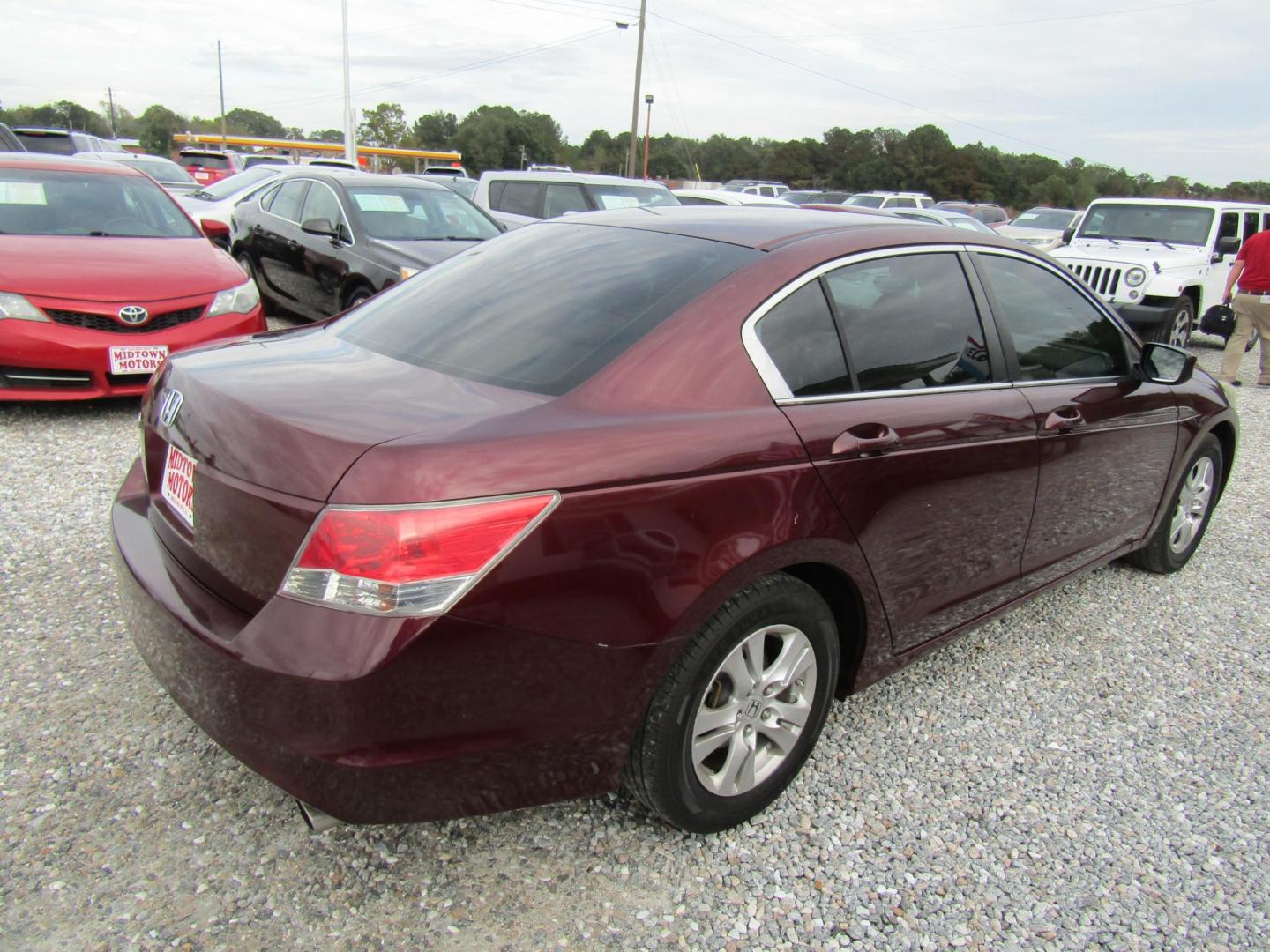 2009 Red Honda Accord LX-P Sedan AT (1HGCP26449A) with an 2.4L L4 DOHC 16V engine, Automatic transmission, located at 15016 S Hwy 231, Midland City, AL, 36350, (334) 983-3001, 31.306210, -85.495277 - Photo#6