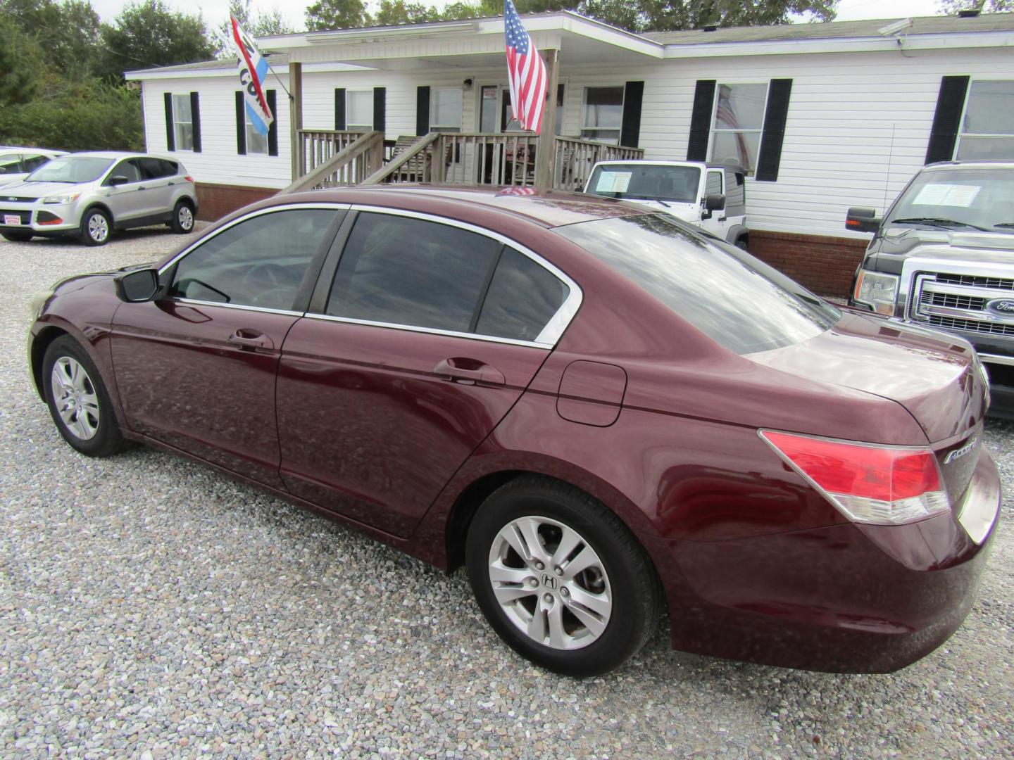 2009 Red Honda Accord LX-P Sedan AT (1HGCP26449A) with an 2.4L L4 DOHC 16V engine, Automatic transmission, located at 15016 S Hwy 231, Midland City, AL, 36350, (334) 983-3001, 31.306210, -85.495277 - Photo#7