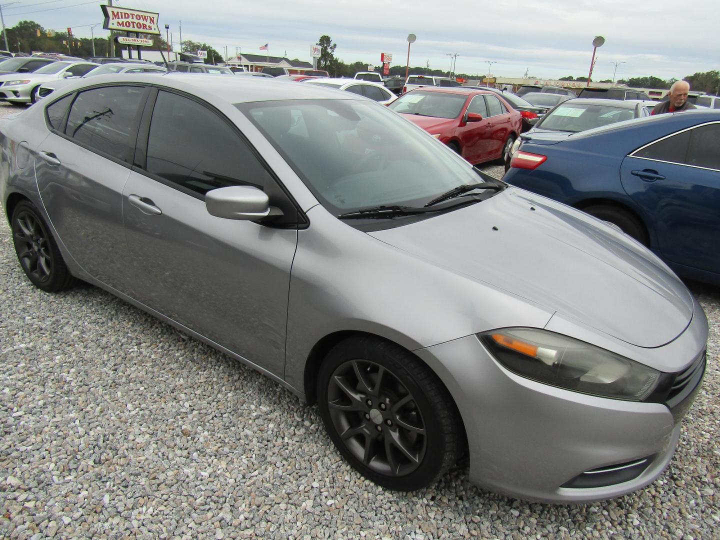 2015 Silver Dodge Dart SE (1C3CDFAA6FD) with an 2.0L L4 DOHC 16V TURBO engine, Automatic transmission, located at 15016 S Hwy 231, Midland City, AL, 36350, (334) 983-3001, 31.306210, -85.495277 - Photo#0