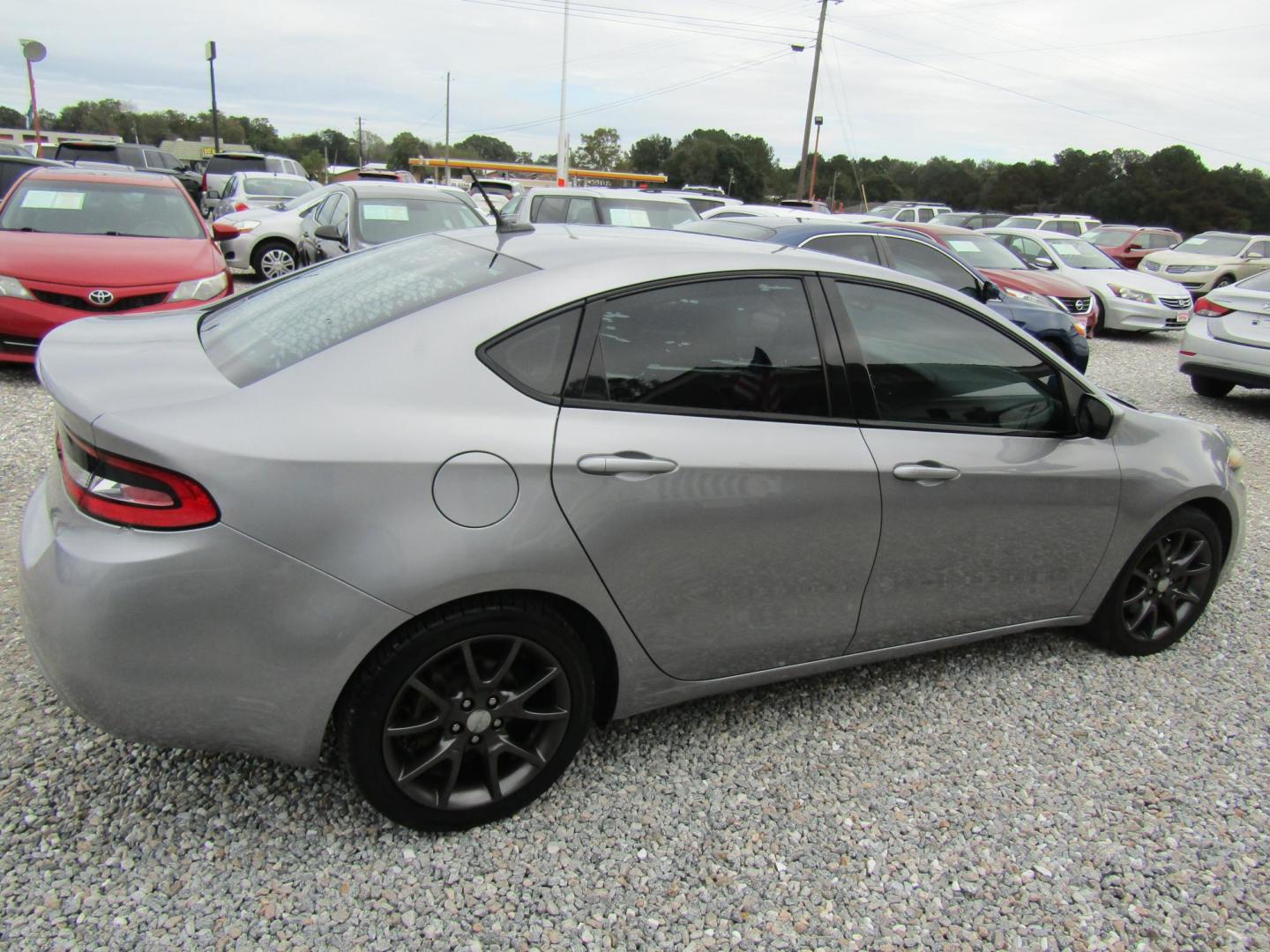 2015 Silver Dodge Dart SE (1C3CDFAA6FD) with an 2.0L L4 DOHC 16V TURBO engine, Automatic transmission, located at 15016 S Hwy 231, Midland City, AL, 36350, (334) 983-3001, 31.306210, -85.495277 - Photo#7