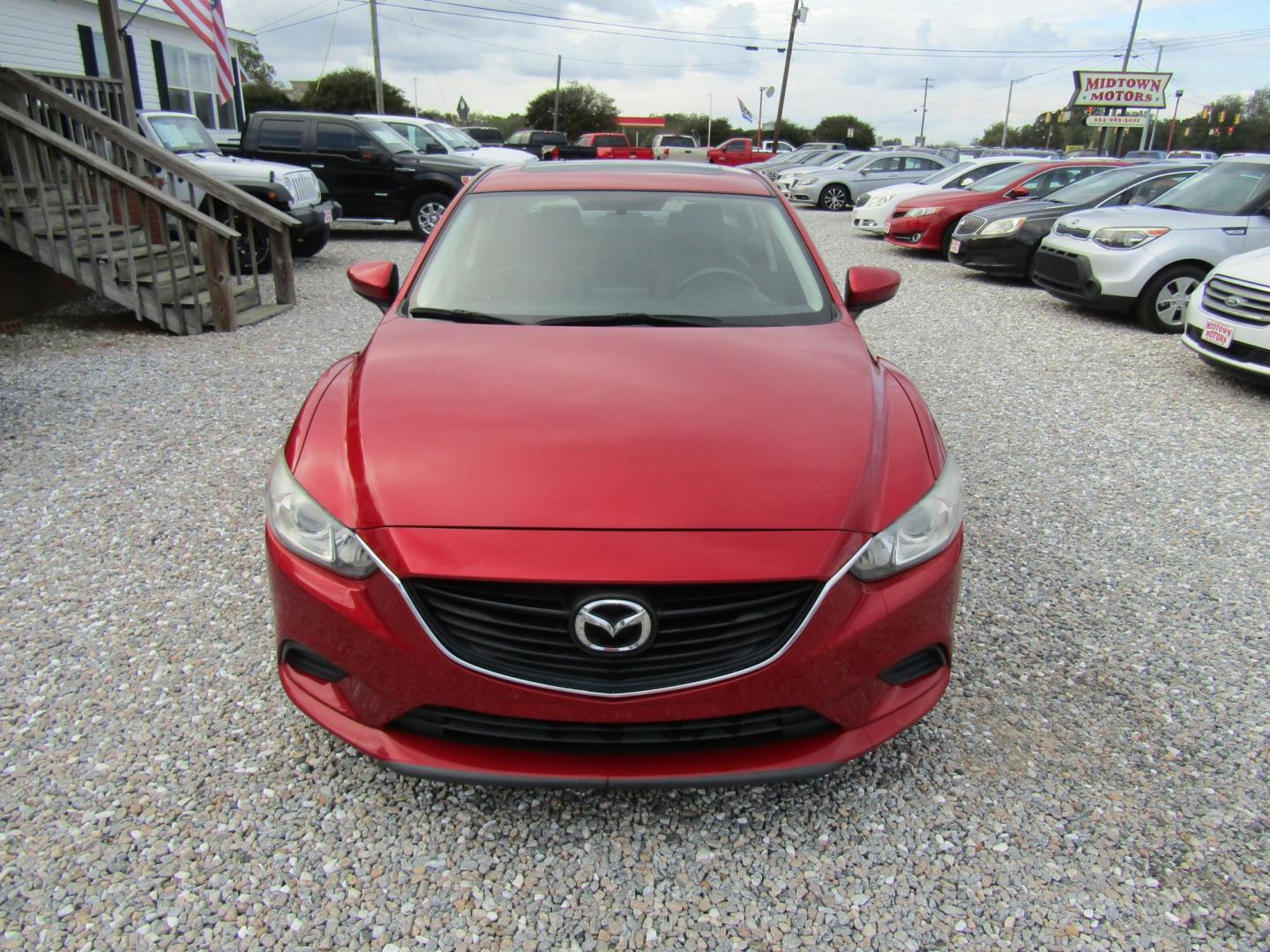 2016 Red Mazda Mazda6 i Touring (JM1GJ1V55G1) with an 2.5L L4 DOHC 16V engine, Automatic transmission, located at 15016 S Hwy 231, Midland City, AL, 36350, (334) 983-3001, 31.306210, -85.495277 - Photo#1