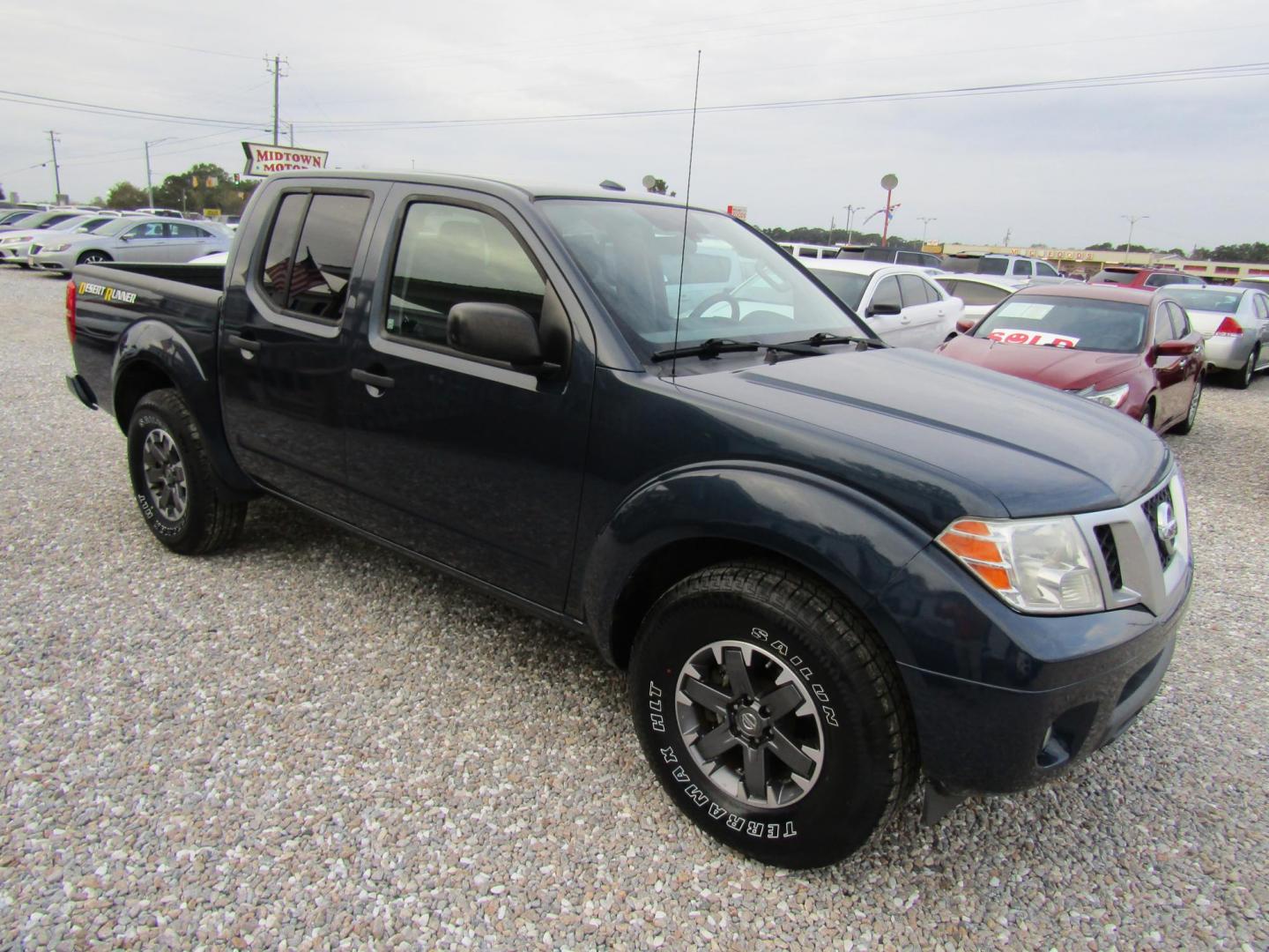 2015 Blue Nissan Frontier S Crew Cab 5AT 2WD (1N6AD0ER4FN) with an 4.0L V6 DOHC 24V engine, Automatic transmission, located at 15016 S Hwy 231, Midland City, AL, 36350, (334) 983-3001, 31.306210, -85.495277 - Photo#0