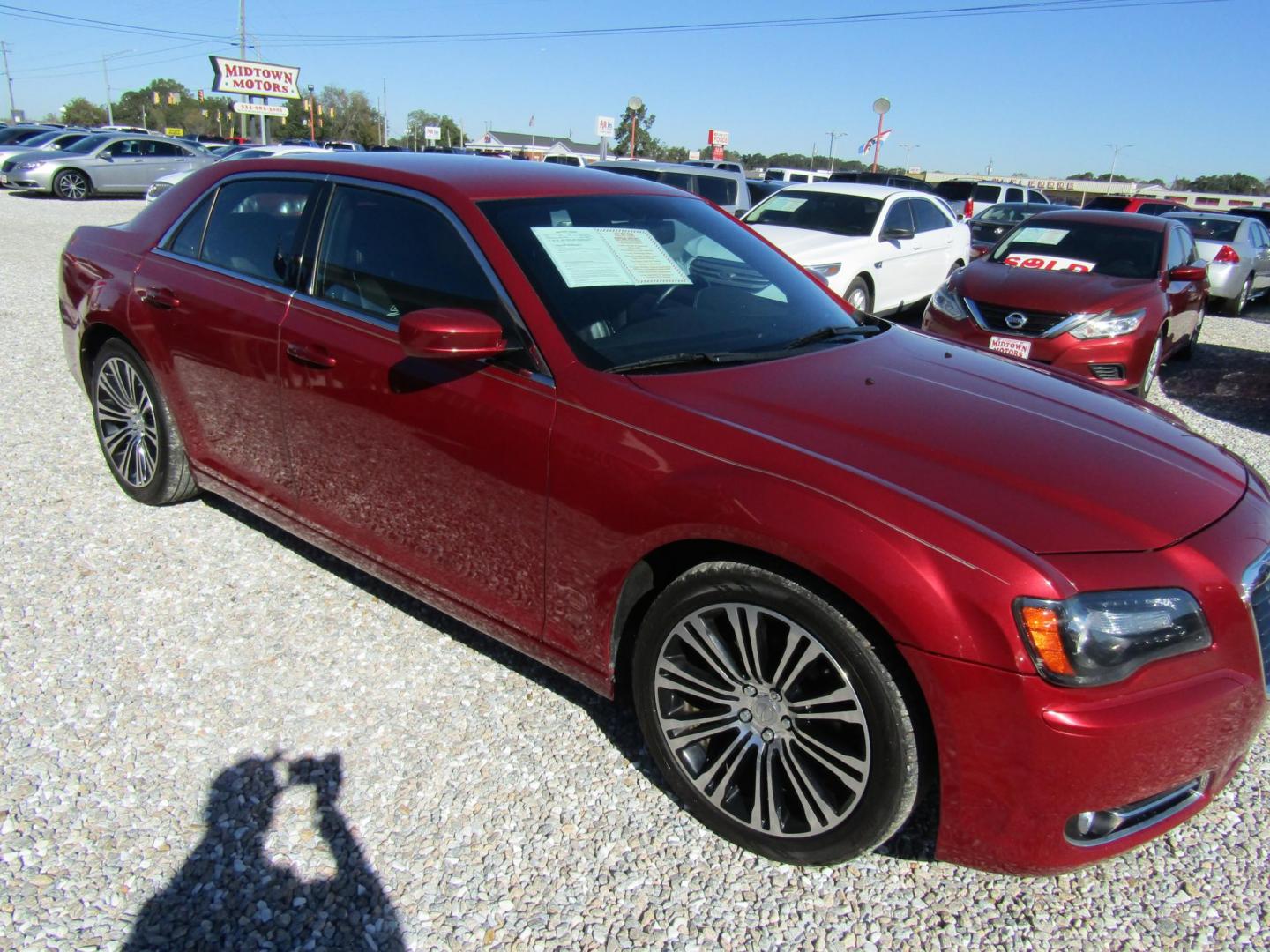 2012 Red Chrysler 300 S V6 RWD (2C3CCABG2CH) with an 3.6L V6 DOHC 24V engine, Automatic transmission, located at 15016 S Hwy 231, Midland City, AL, 36350, (334) 983-3001, 31.306210, -85.495277 - Photo#0