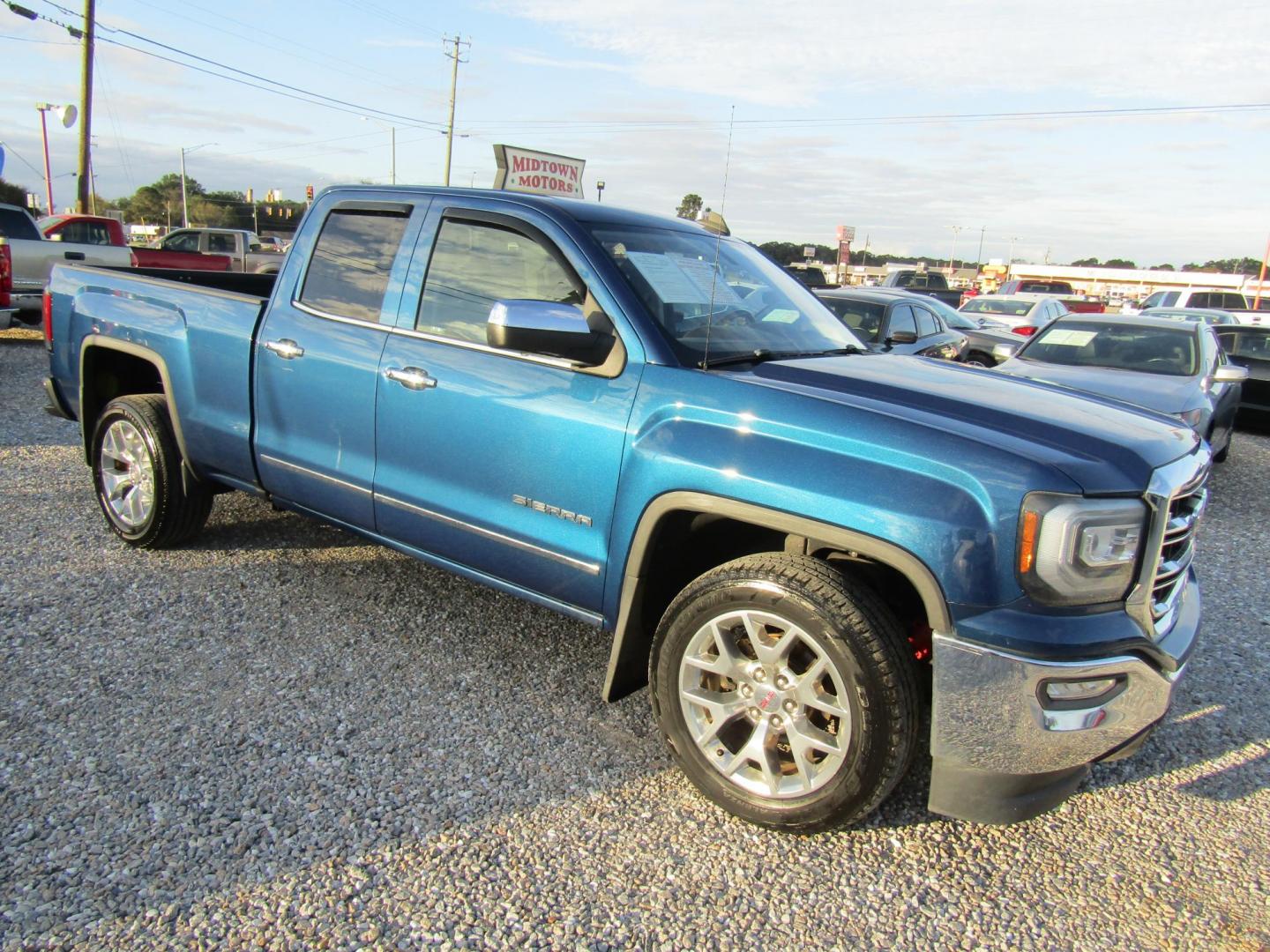 2016 Blue GMC Sierra 1500 SLT Double Cab 2WD (1GTR1NEC9GZ) with an 5.3L V8 OHV 16V engine, Automatic transmission, located at 15016 S Hwy 231, Midland City, AL, 36350, (334) 983-3001, 31.306210, -85.495277 - Photo#0