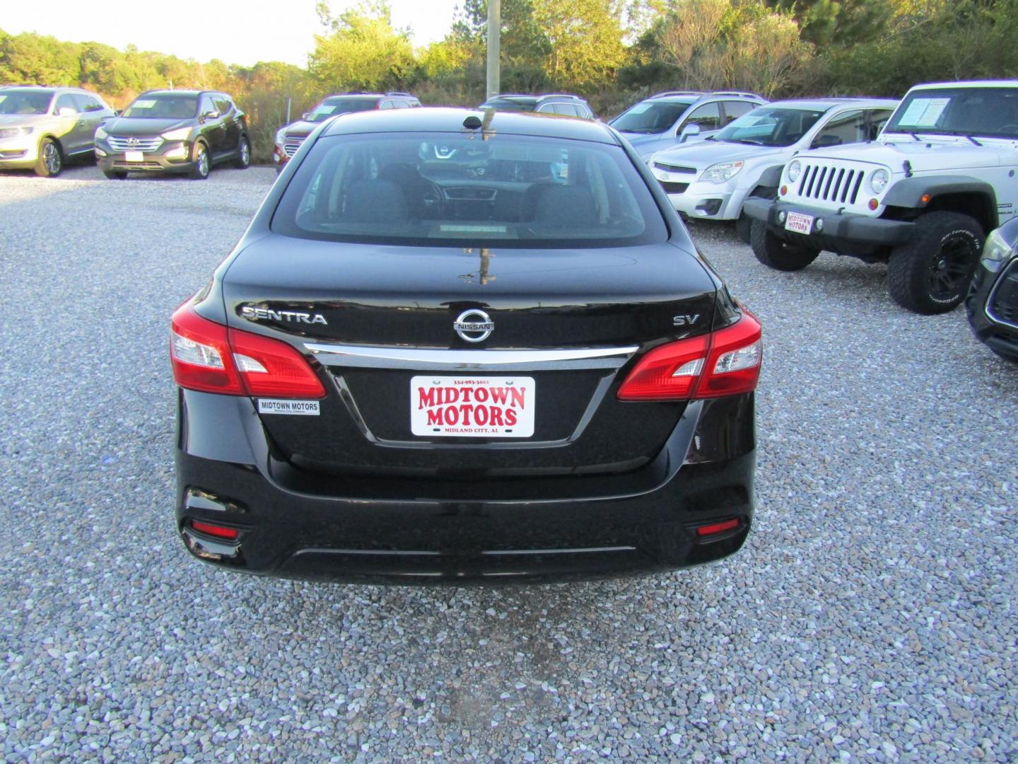 2019 Black Nissan Sentra S CVT (3N1AB7AP2KY) with an 1.8L L4 SFI DOHC 16V engine, Automatic transmission, located at 15016 S Hwy 231, Midland City, AL, 36350, (334) 983-3001, 31.306210, -85.495277 - Photo#7