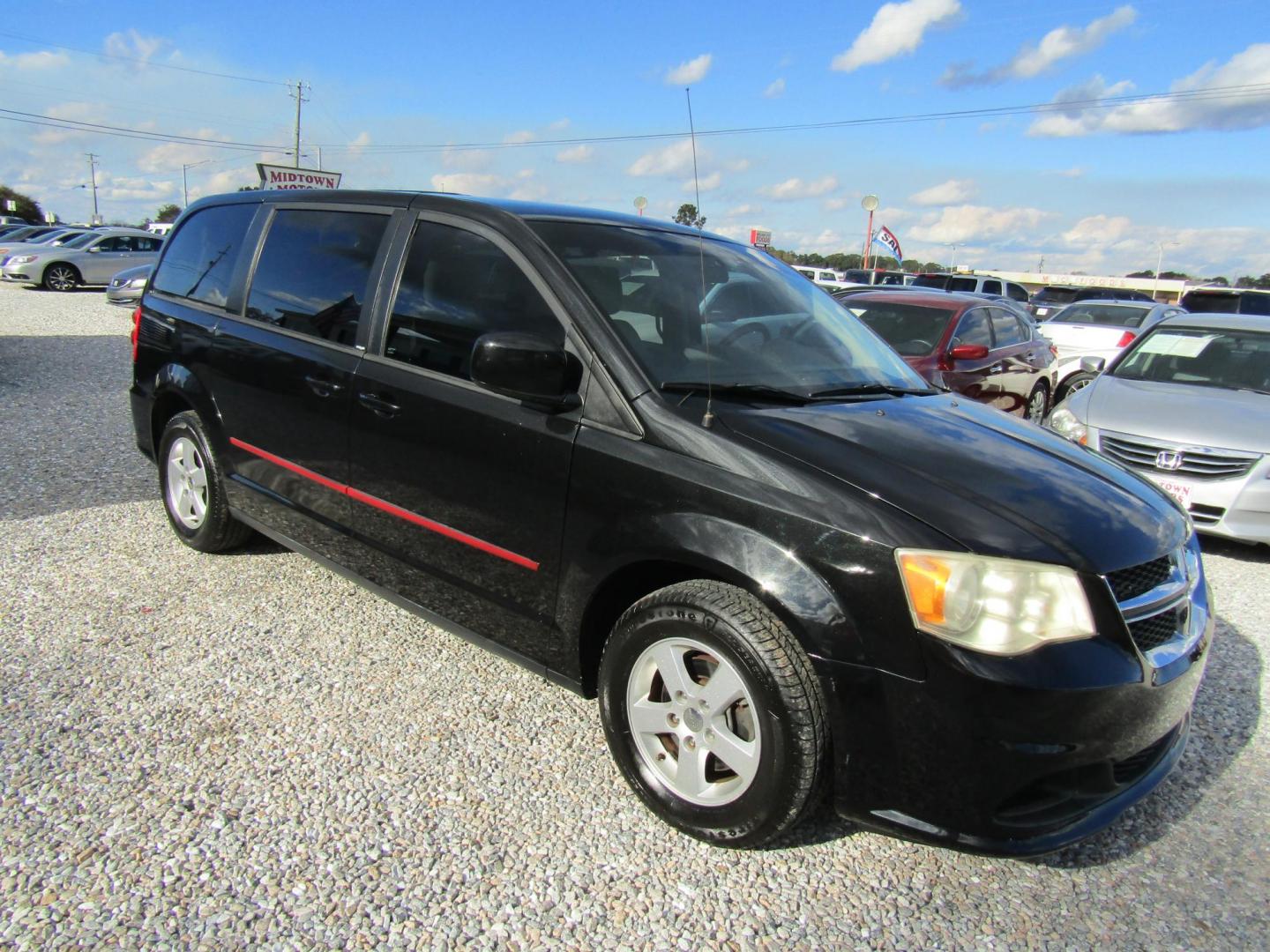 2012 Black Dodge Grand Caravan SXT (2C4RDGCG5CR) with an 3.6L V6 DOHC 24V engine, Automatic transmission, located at 15016 S Hwy 231, Midland City, AL, 36350, (334) 983-3001, 31.306210, -85.495277 - Photo#0