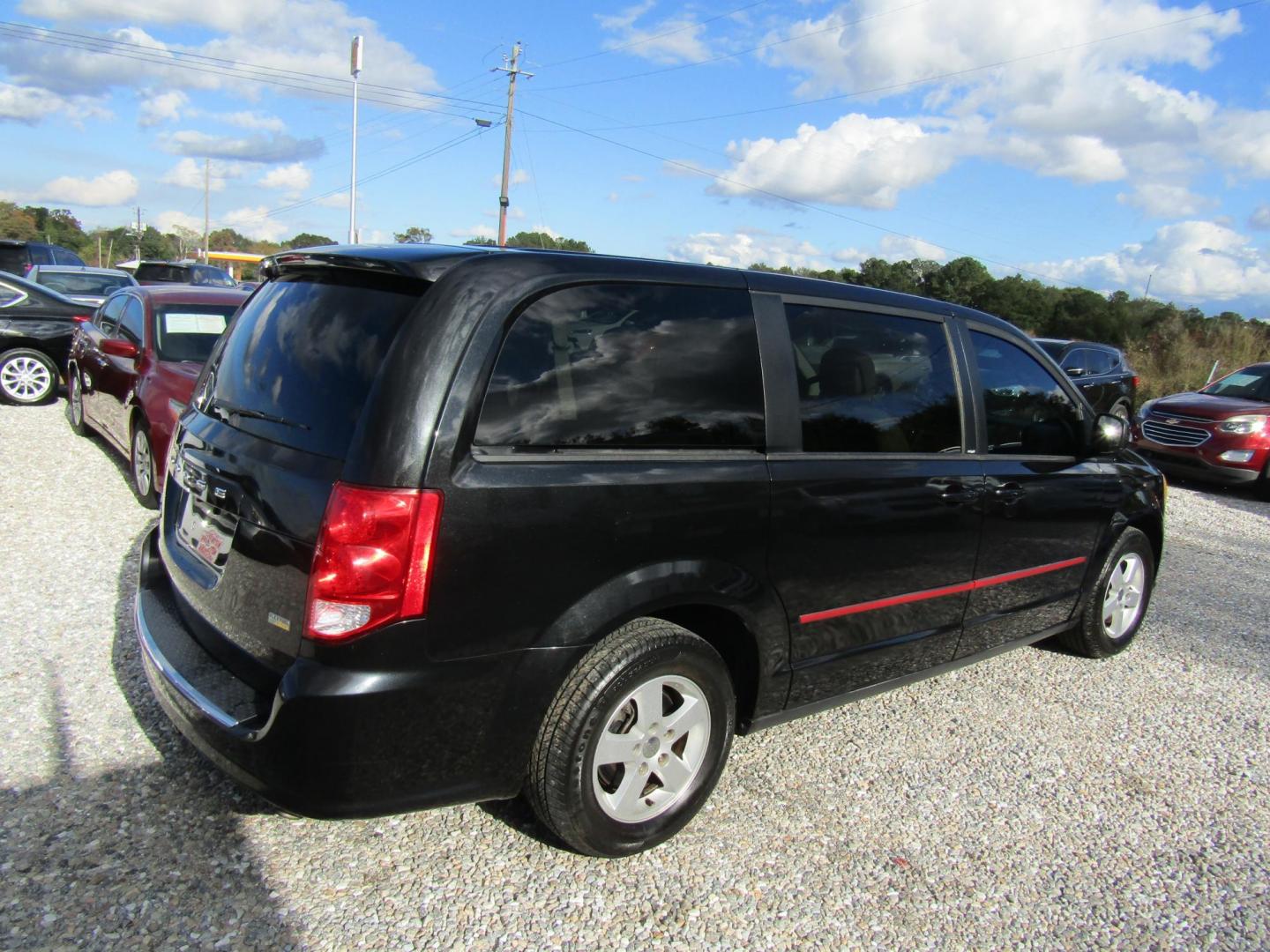 2012 Black Dodge Grand Caravan SXT (2C4RDGCG5CR) with an 3.6L V6 DOHC 24V engine, Automatic transmission, located at 15016 S Hwy 231, Midland City, AL, 36350, (334) 983-3001, 31.306210, -85.495277 - Photo#7