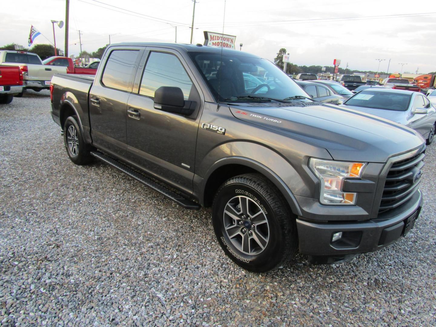 2015 Gray Ford F-150 XLT SuperCrew 6.5-ft. Bed 4WD (1FTEW1CG0FK) with an 3.5L V6 TURBO engine, Automatic transmission, located at 15016 S Hwy 231, Midland City, AL, 36350, (334) 983-3001, 31.306210, -85.495277 - Photo#0