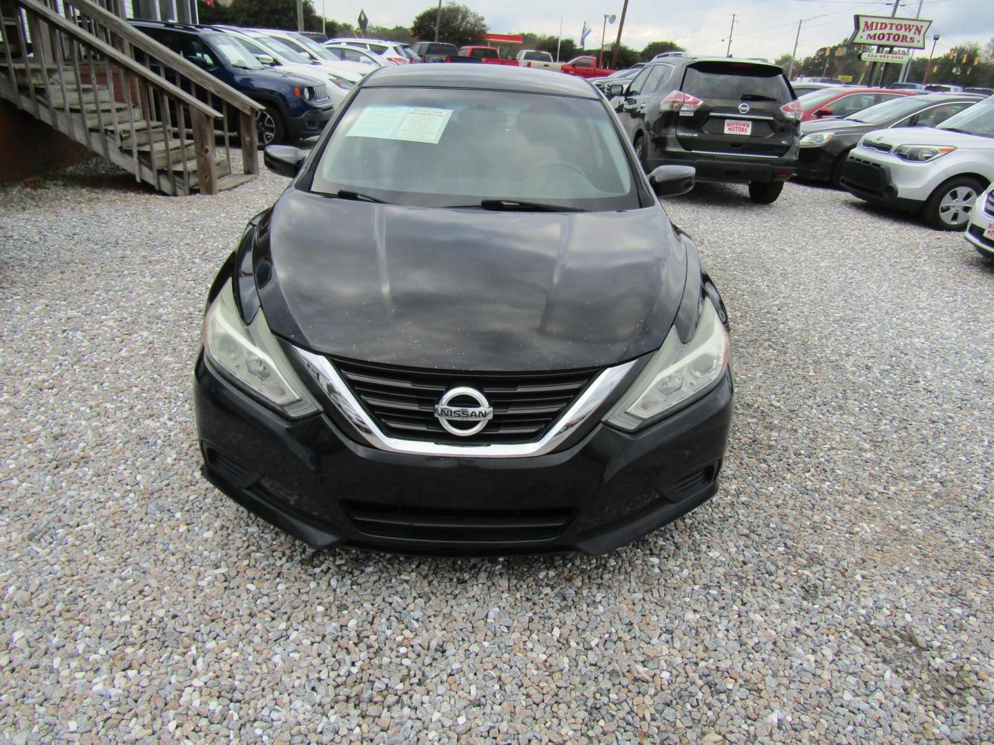 2016 Black Nissan Altima 2.5 SL (1N4AL3AP3GN) with an 2.5L L4 DOHC 16V engine, Automatic transmission, located at 15016 S Hwy 231, Midland City, AL, 36350, (334) 983-3001, 31.306210, -85.495277 - Photo#1