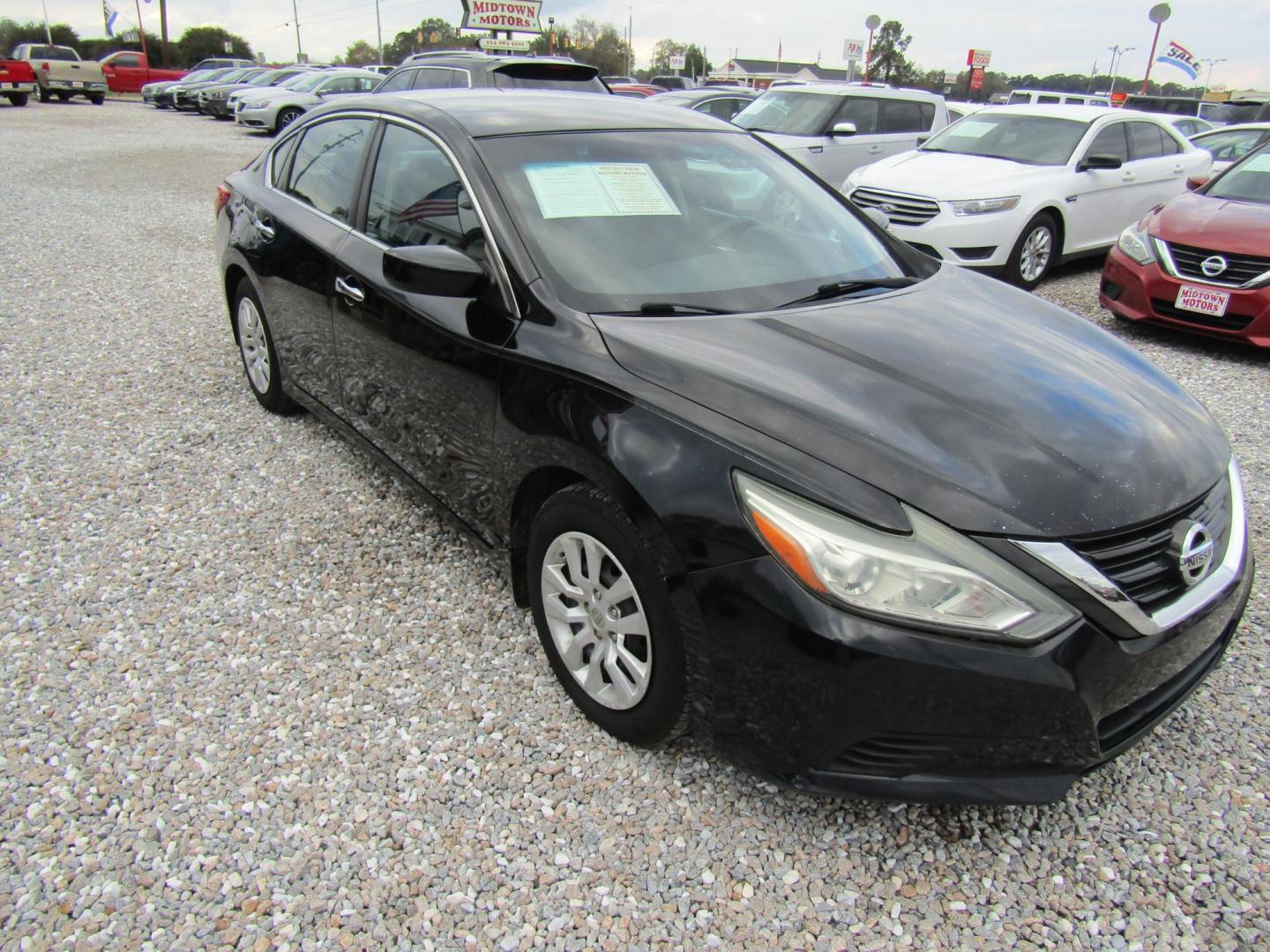 2016 Black Nissan Altima 2.5 SL (1N4AL3AP3GN) with an 2.5L L4 DOHC 16V engine, Automatic transmission, located at 15016 S Hwy 231, Midland City, AL, 36350, (334) 983-3001, 31.306210, -85.495277 - Photo#0