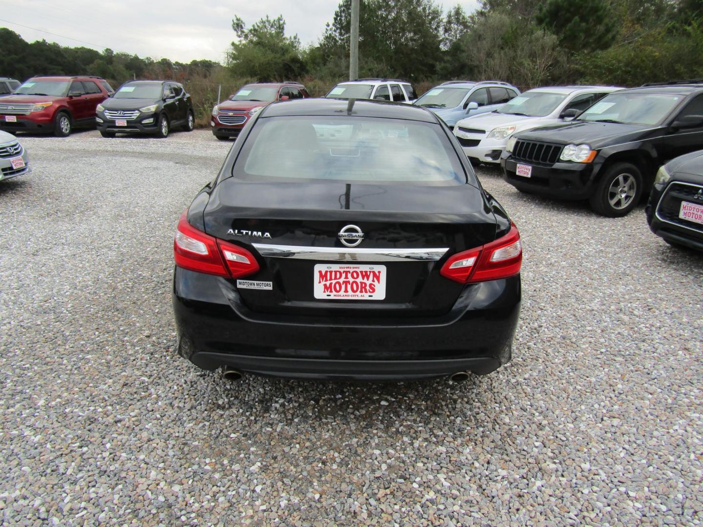 2016 Black Nissan Altima 2.5 SL (1N4AL3AP3GN) with an 2.5L L4 DOHC 16V engine, Automatic transmission, located at 15016 S Hwy 231, Midland City, AL, 36350, (334) 983-3001, 31.306210, -85.495277 - Photo#6