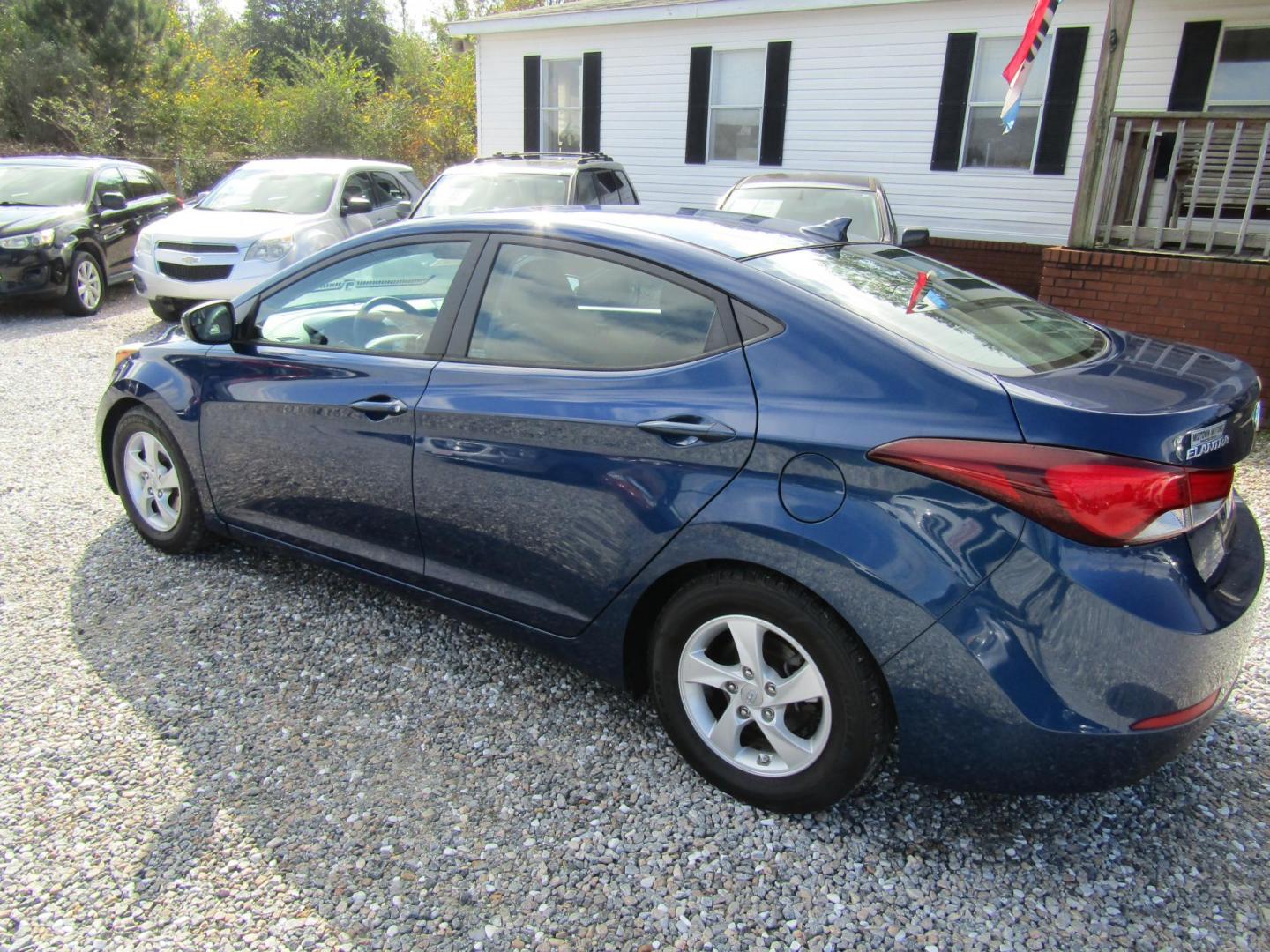 2015 Blue Hyundai Elantra Limited (5NPDH4AE5FH) with an 1.8L L4 DOHC 16V engine, Automatic transmission, located at 15016 S Hwy 231, Midland City, AL, 36350, (334) 983-3001, 31.306210, -85.495277 - Photo#5