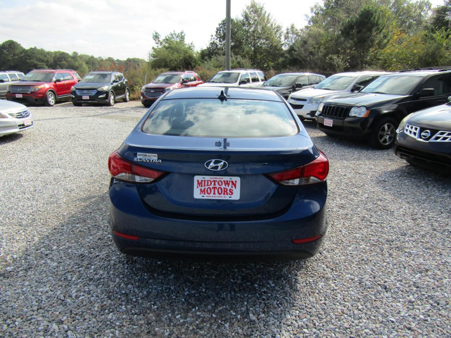 2015 Blue Hyundai Elantra Limited (5NPDH4AE5FH) with an 1.8L L4 DOHC 16V engine, Automatic transmission, located at 15016 S Hwy 231, Midland City, AL, 36350, (334) 983-3001, 31.306210, -85.495277 - Photo#6