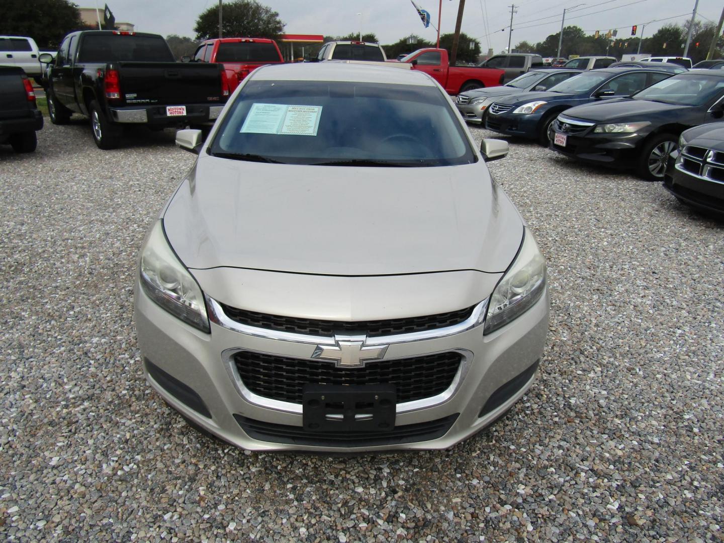 2015 Gold Chevrolet Malibu 1LT (1G11C5SLXFF) with an 2.5L L4 DOHC 16V engine, Automatic transmission, located at 15016 S Hwy 231, Midland City, AL, 36350, (334) 983-3001, 31.306210, -85.495277 - Photo#2