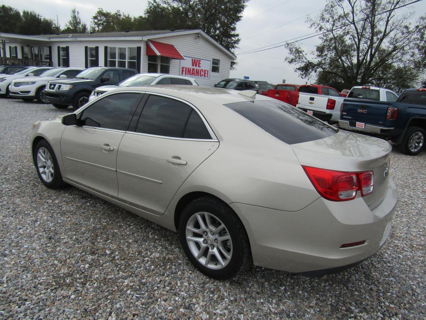 2015 Gold Chevrolet Malibu 1LT (1G11C5SLXFF) with an 2.5L L4 DOHC 16V engine, Automatic transmission, located at 15016 S Hwy 231, Midland City, AL, 36350, (334) 983-3001, 31.306210, -85.495277 - Photo#5