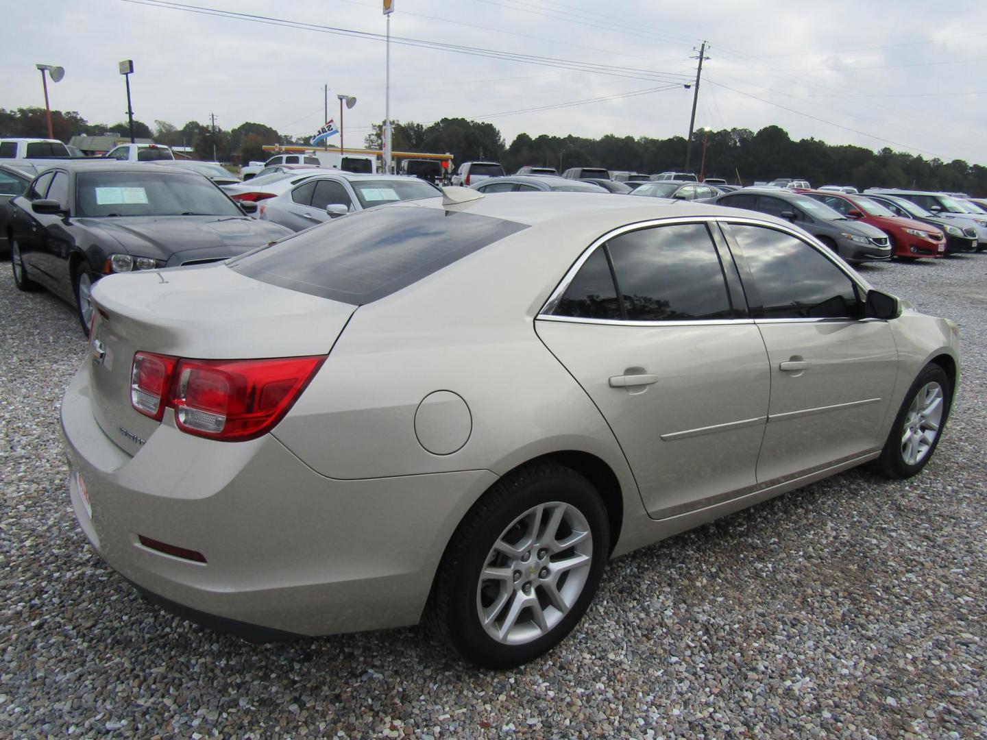 2015 Gold Chevrolet Malibu 1LT (1G11C5SLXFF) with an 2.5L L4 DOHC 16V engine, Automatic transmission, located at 15016 S Hwy 231, Midland City, AL, 36350, (334) 983-3001, 31.306210, -85.495277 - Photo#7