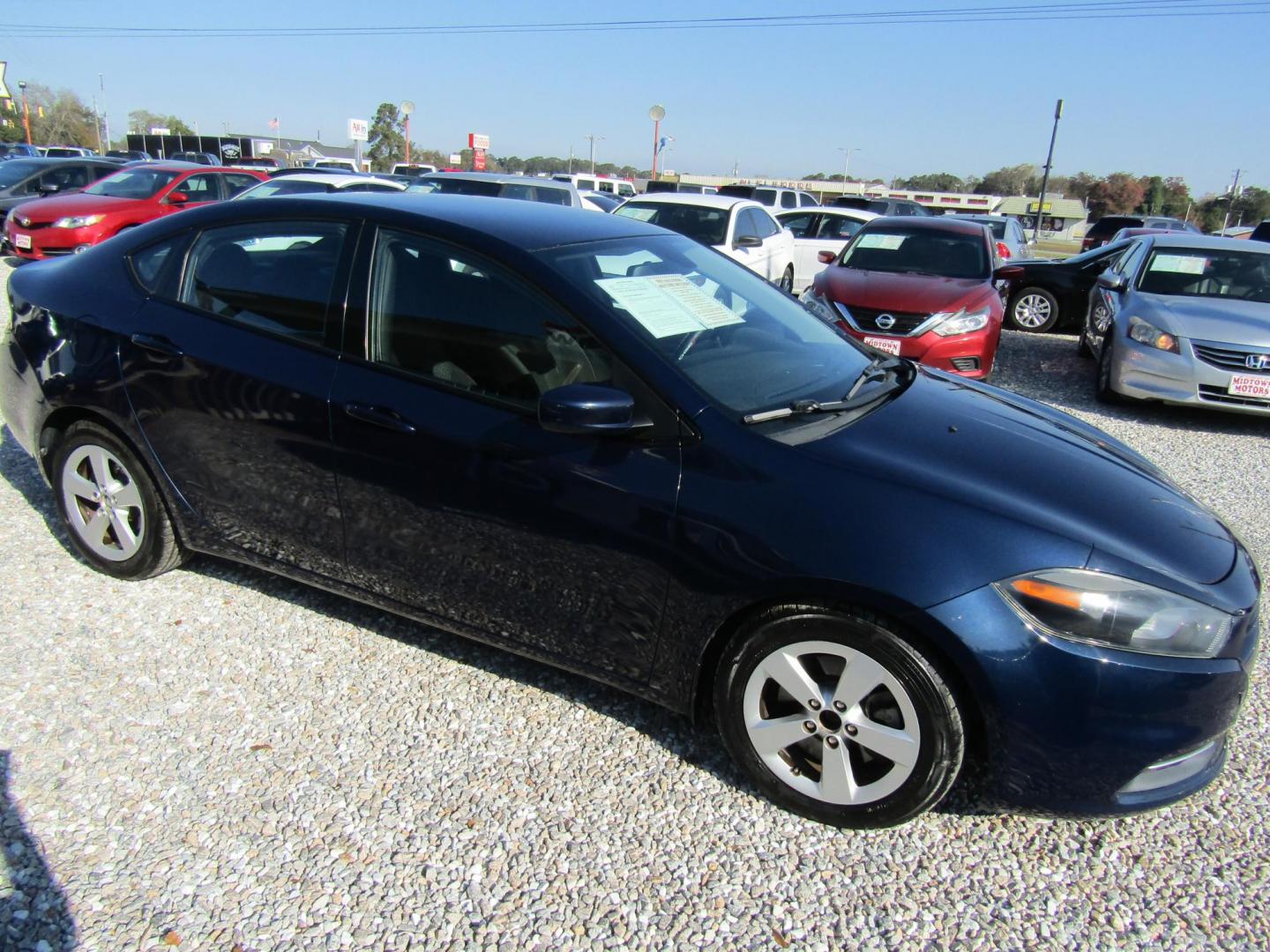 2015 Blue Dodge Dart SXT (1C3CDFBB5FD) with an 2.4L L4 DOHC 16V engine, Automatic transmission, located at 15016 S Hwy 231, Midland City, AL, 36350, (334) 983-3001, 31.306210, -85.495277 - Photo#0