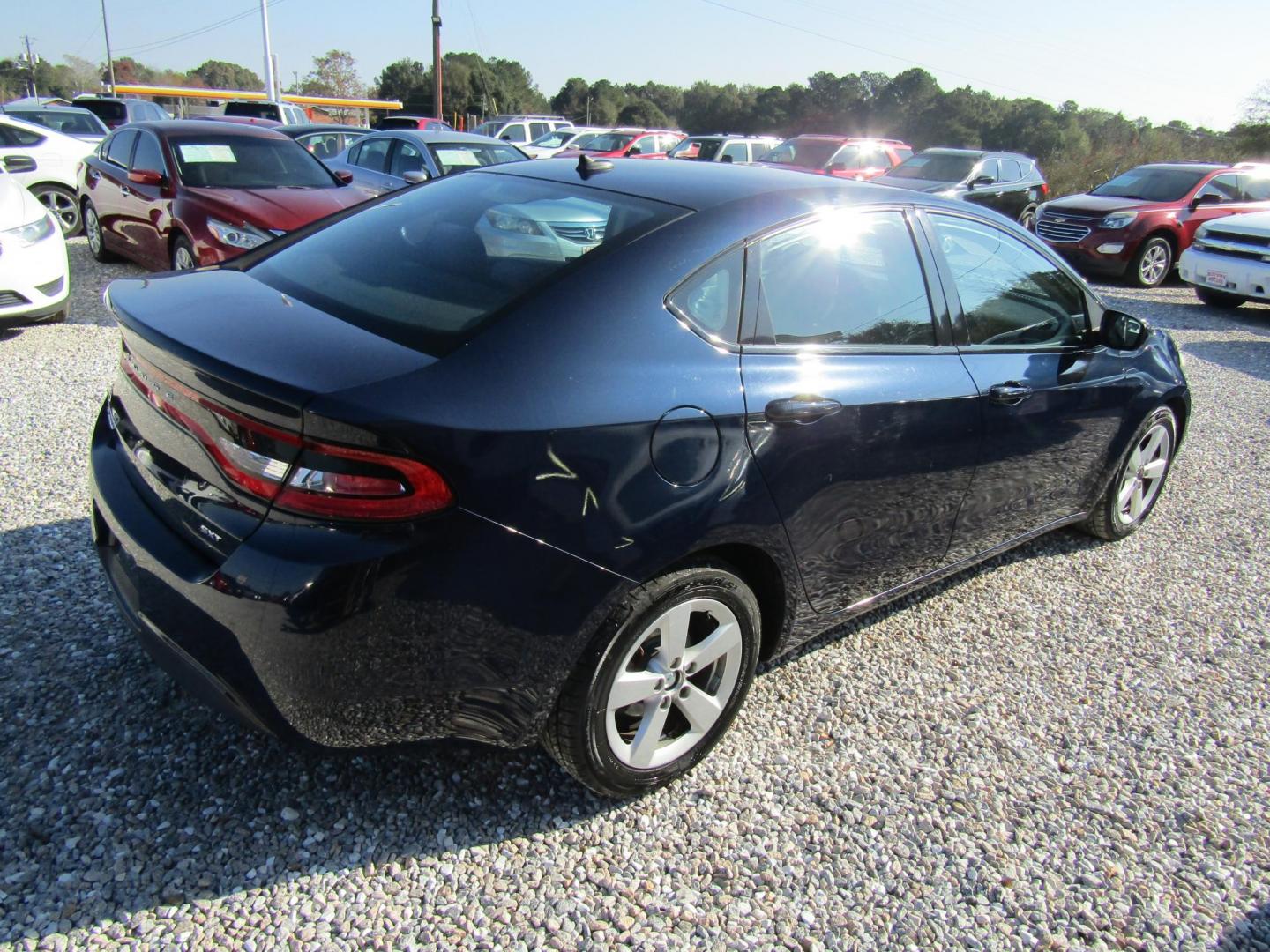 2015 Blue Dodge Dart SXT (1C3CDFBB5FD) with an 2.4L L4 DOHC 16V engine, Automatic transmission, located at 15016 S Hwy 231, Midland City, AL, 36350, (334) 983-3001, 31.306210, -85.495277 - Photo#9