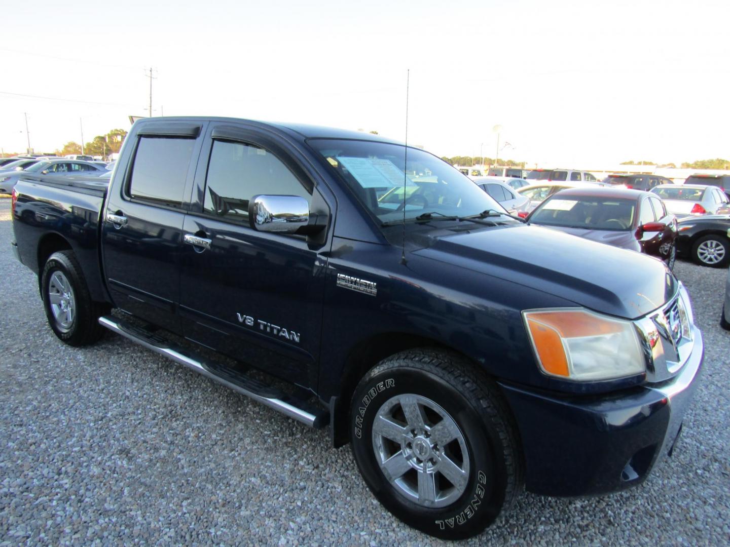 2012 Blue Nissan Titan SL Crew Cab 2WD (1N6AA0EDXCN) with an 5.6L V8 DOHC 32V engine, Automatic transmission, located at 15016 S Hwy 231, Midland City, AL, 36350, (334) 983-3001, 31.306210, -85.495277 - Photo#0