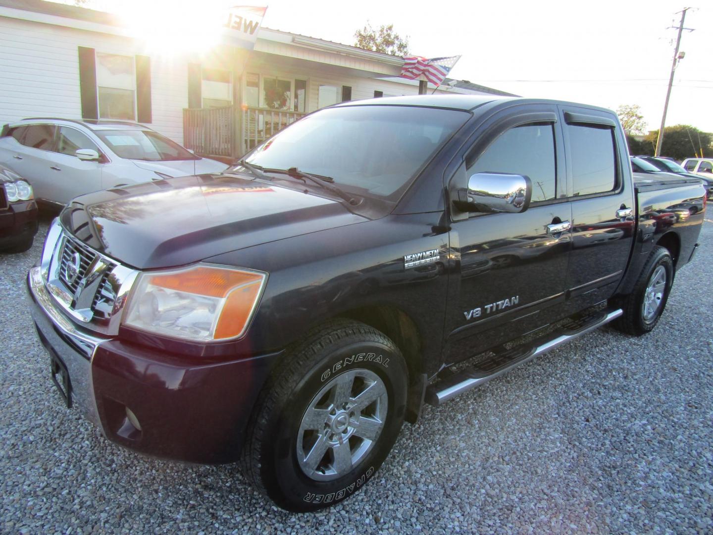 2012 Blue Nissan Titan SL Crew Cab 2WD (1N6AA0EDXCN) with an 5.6L V8 DOHC 32V engine, Automatic transmission, located at 15016 S Hwy 231, Midland City, AL, 36350, (334) 983-3001, 31.306210, -85.495277 - Photo#4