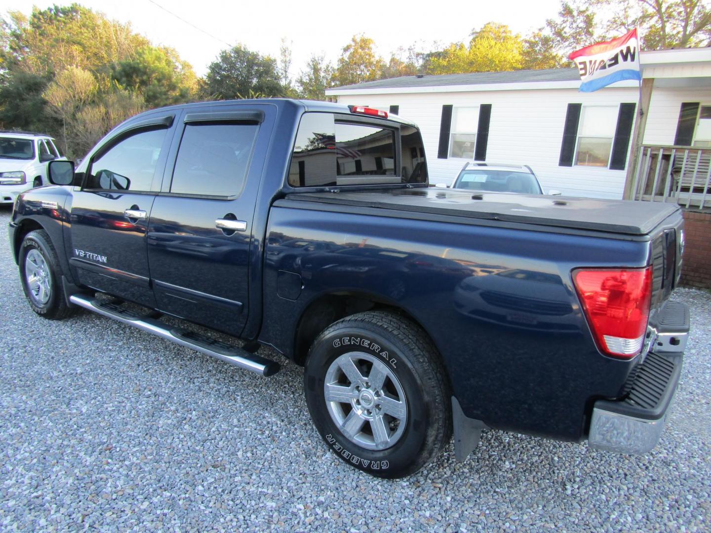 2012 Blue Nissan Titan SL Crew Cab 2WD (1N6AA0EDXCN) with an 5.6L V8 DOHC 32V engine, Automatic transmission, located at 15016 S Hwy 231, Midland City, AL, 36350, (334) 983-3001, 31.306210, -85.495277 - Photo#5