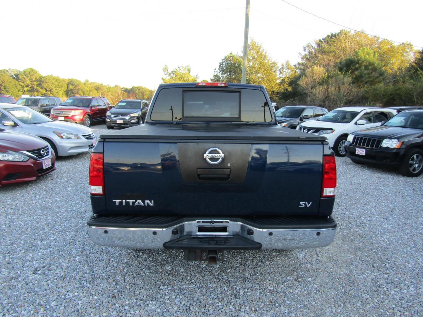 2012 Blue Nissan Titan SL Crew Cab 2WD (1N6AA0EDXCN) with an 5.6L V8 DOHC 32V engine, Automatic transmission, located at 15016 S Hwy 231, Midland City, AL, 36350, (334) 983-3001, 31.306210, -85.495277 - Photo#6