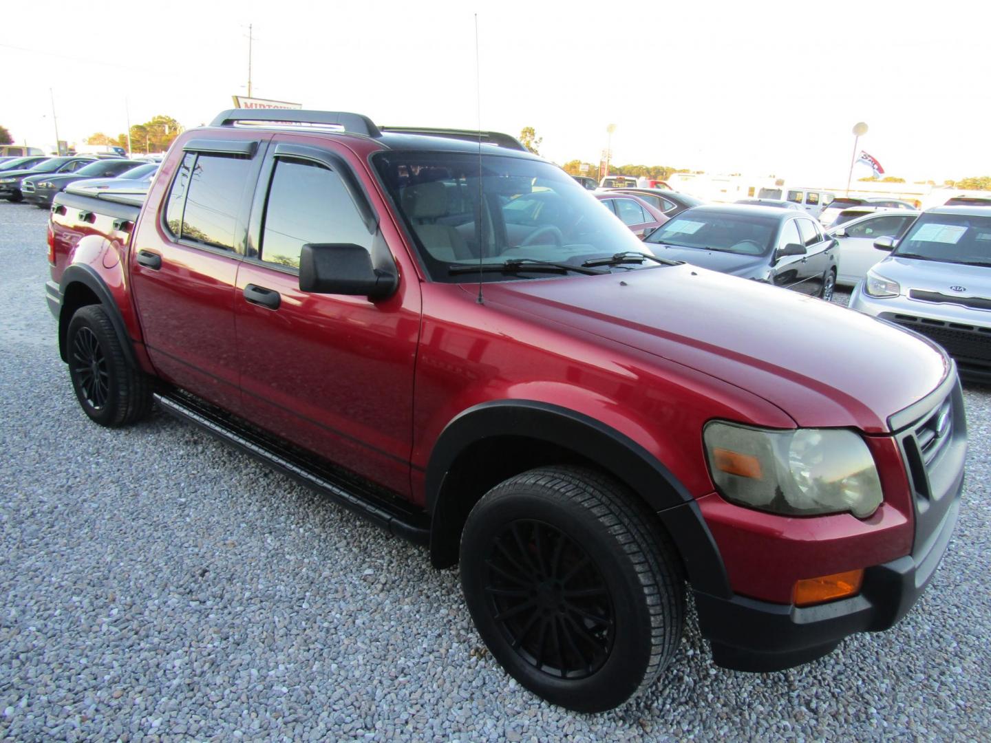 2008 Red Ford Explorer Sport Trac XLT 4.0L 2WD (1FMEU31E38U) with an 4.0L V6 SOHC 12V engine, Automatic transmission, located at 15016 S Hwy 231, Midland City, AL, 36350, (334) 983-3001, 31.306210, -85.495277 - Photo#0