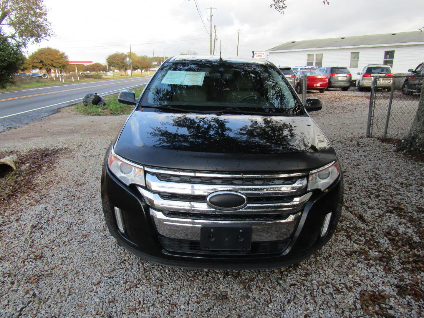 2013 Black Ford Edge SEL FWD (2FMDK3JC7DB) with an 3.5L V6 DOHC 24V engine, Automatic transmission, located at 15016 S Hwy 231, Midland City, AL, 36350, (334) 983-3001, 31.306210, -85.495277 - Photo#1