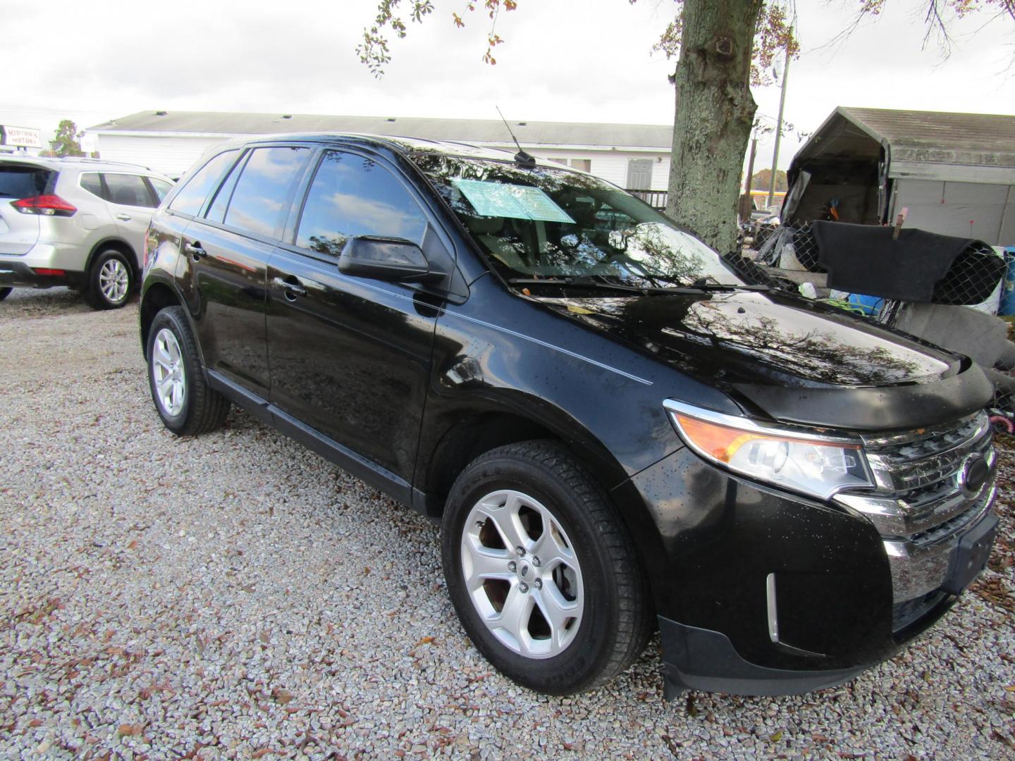 2013 Black Ford Edge SEL FWD (2FMDK3JC7DB) with an 3.5L V6 DOHC 24V engine, Automatic transmission, located at 15016 S Hwy 231, Midland City, AL, 36350, (334) 983-3001, 31.306210, -85.495277 - Photo#0