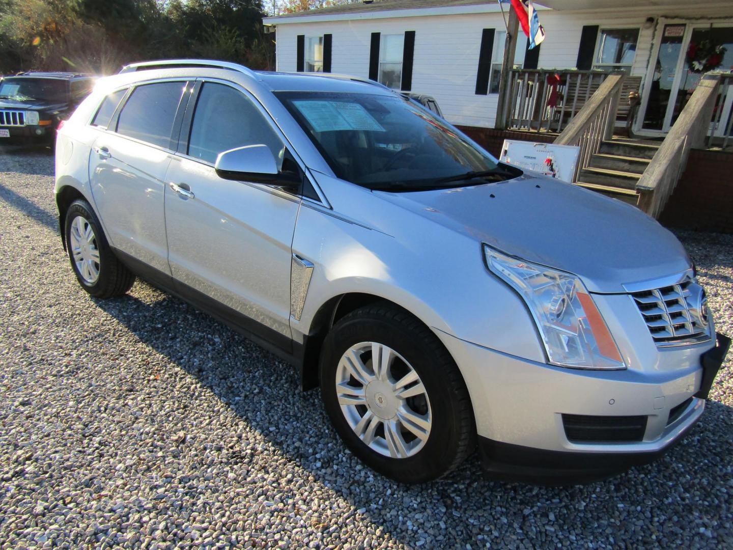 2016 Silver Cadillac SRX Luxury Collection FWD (3GYFNBE33GS) with an 3.6L V6 DOHC 24V FFV engine, Automatic transmission, located at 15016 S Hwy 231, Midland City, AL, 36350, (334) 983-3001, 31.306210, -85.495277 - Photo#0