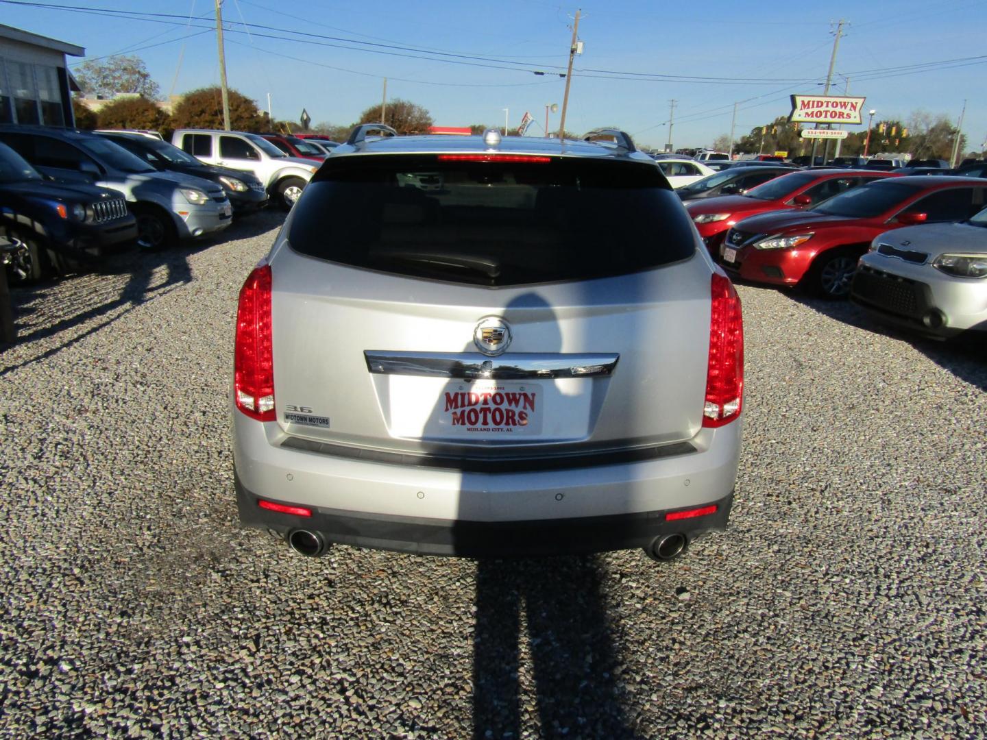 2016 Silver Cadillac SRX Luxury Collection FWD (3GYFNBE33GS) with an 3.6L V6 DOHC 24V FFV engine, Automatic transmission, located at 15016 S Hwy 231, Midland City, AL, 36350, (334) 983-3001, 31.306210, -85.495277 - Photo#6