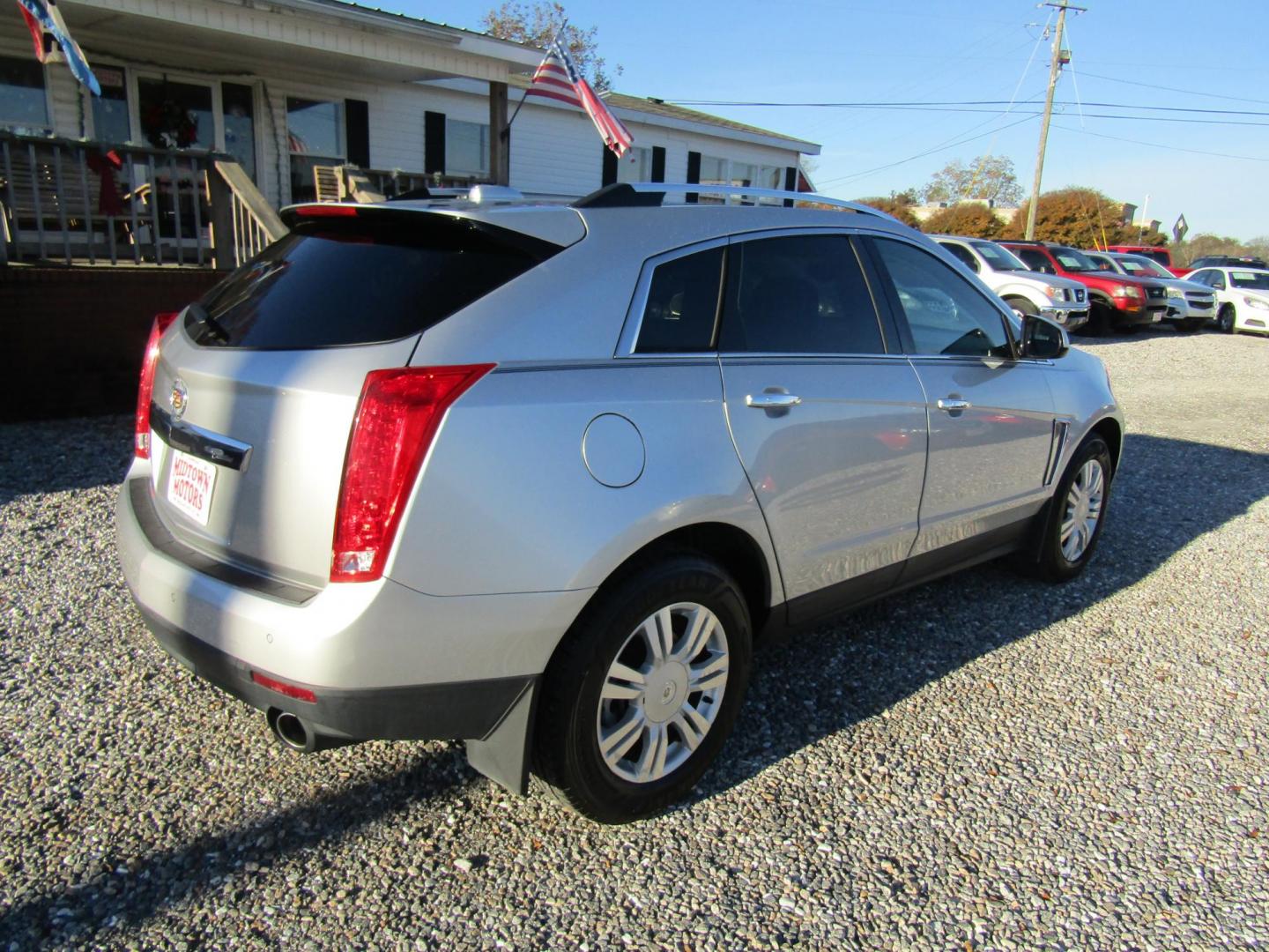 2016 Silver Cadillac SRX Luxury Collection FWD (3GYFNBE33GS) with an 3.6L V6 DOHC 24V FFV engine, Automatic transmission, located at 15016 S Hwy 231, Midland City, AL, 36350, (334) 983-3001, 31.306210, -85.495277 - Photo#7