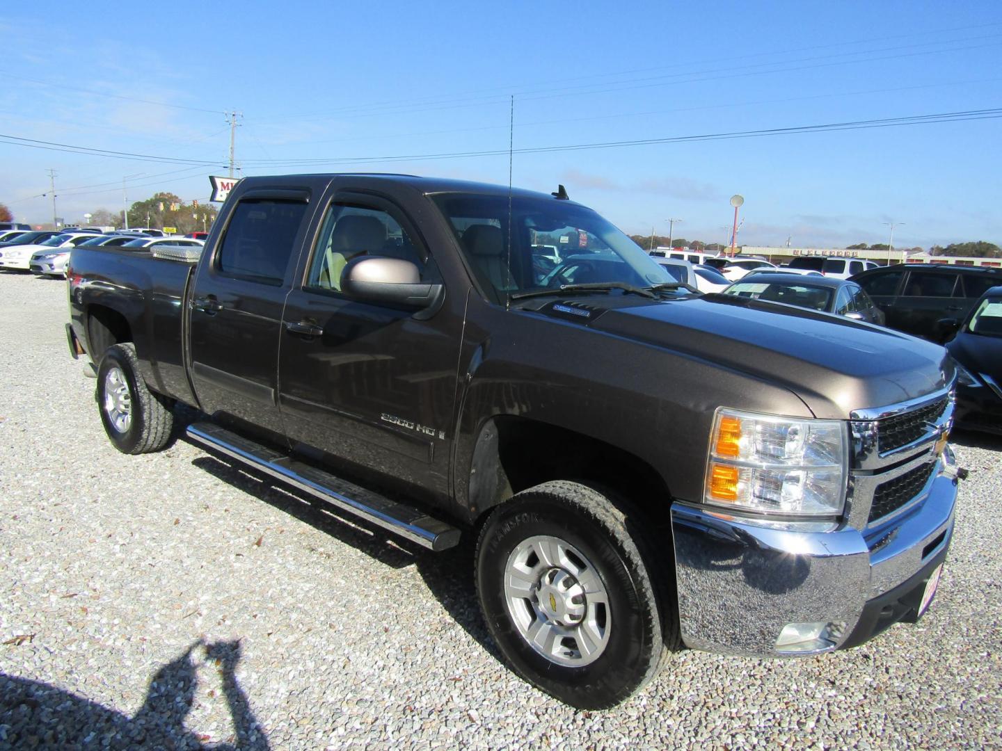 2007 Brown Chevrolet Silverado 2500HD LT1 Crew Cab 4WD (1GCHK236X7F) with an 6.6L V8 OHV 32V TURBO DIESEL engine, Automatic transmission, located at 15016 S Hwy 231, Midland City, AL, 36350, (334) 983-3001, 31.306210, -85.495277 - Photo#0