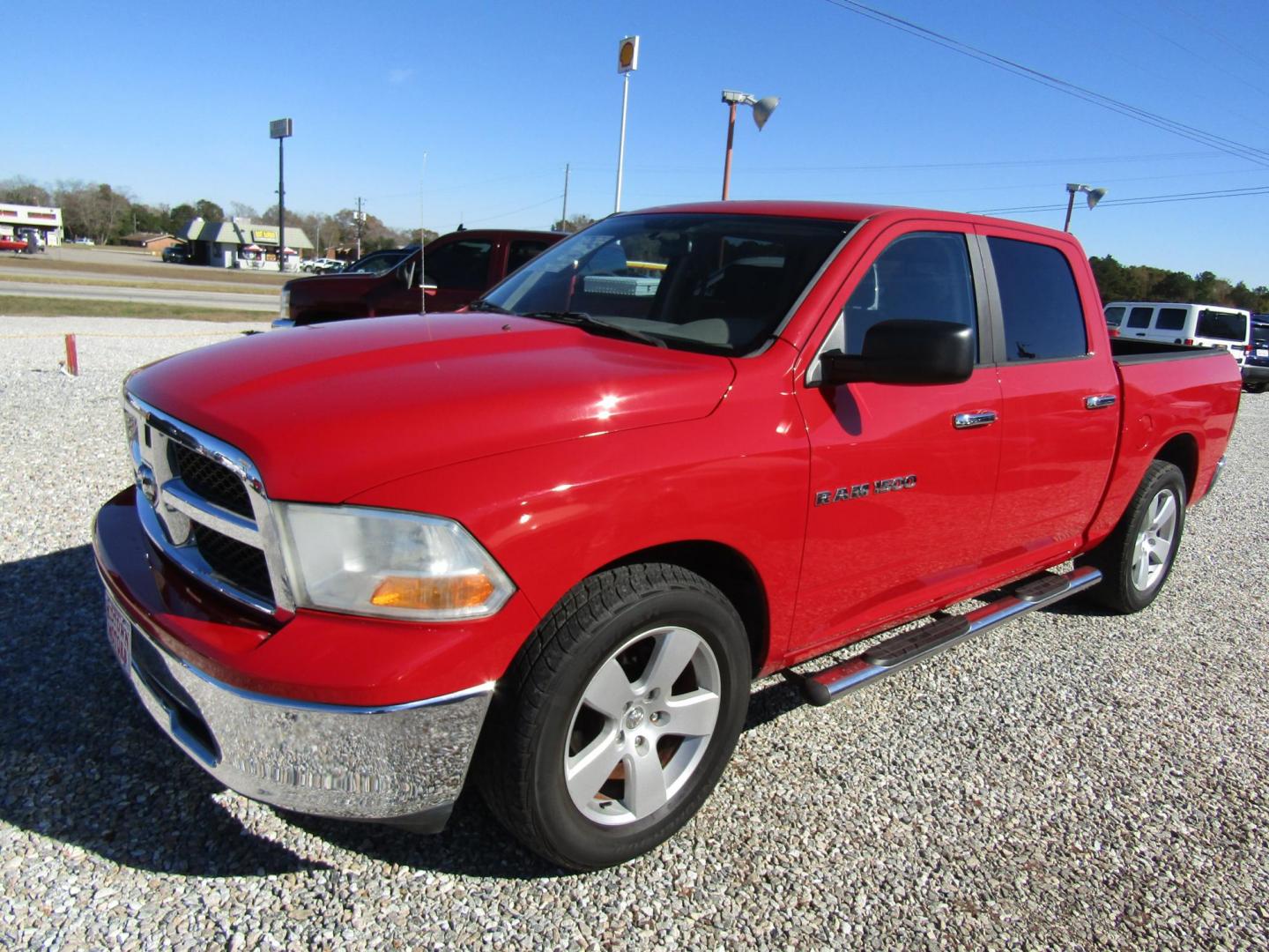 2011 Red Dodge Ram 1500 SLT Crew Cab 2WD (1D7RB1CP2BS) with an 4.7L V8 SOHC 16V FFV engine, 5-Speed Automatic transmission, located at 15016 S Hwy 231, Midland City, AL, 36350, (334) 983-3001, 31.306210, -85.495277 - Photo#2