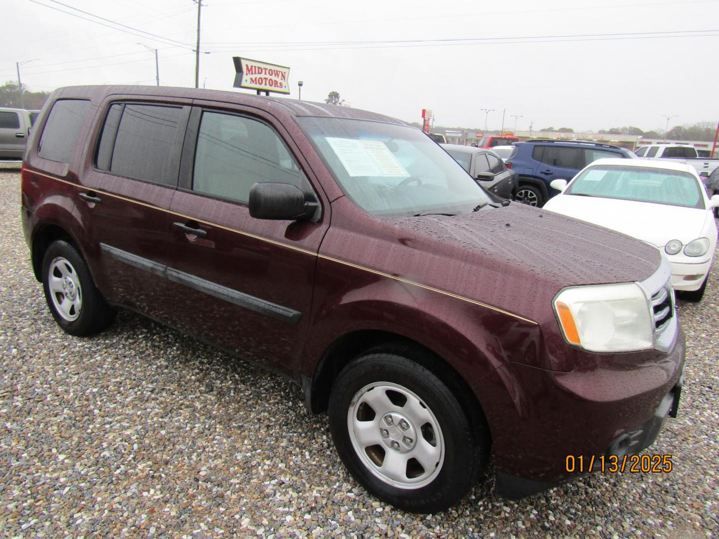 2013 Burgandy Honda Pilot LX 2WD 5-Spd AT (5FNYF3H23DB) with an 3.5L V6 SOHC 24V engine, Automatic transmission, located at 15016 S Hwy 231, Midland City, AL, 36350, (334) 983-3001, 31.306210, -85.495277 - Photo#0