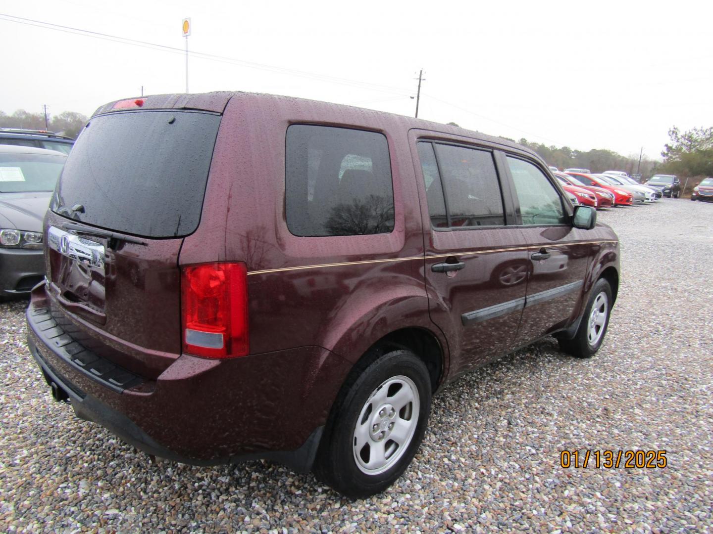 2013 Burgandy Honda Pilot LX 2WD 5-Spd AT (5FNYF3H23DB) with an 3.5L V6 SOHC 24V engine, Automatic transmission, located at 15016 S Hwy 231, Midland City, AL, 36350, (334) 983-3001, 31.306210, -85.495277 - Photo#6