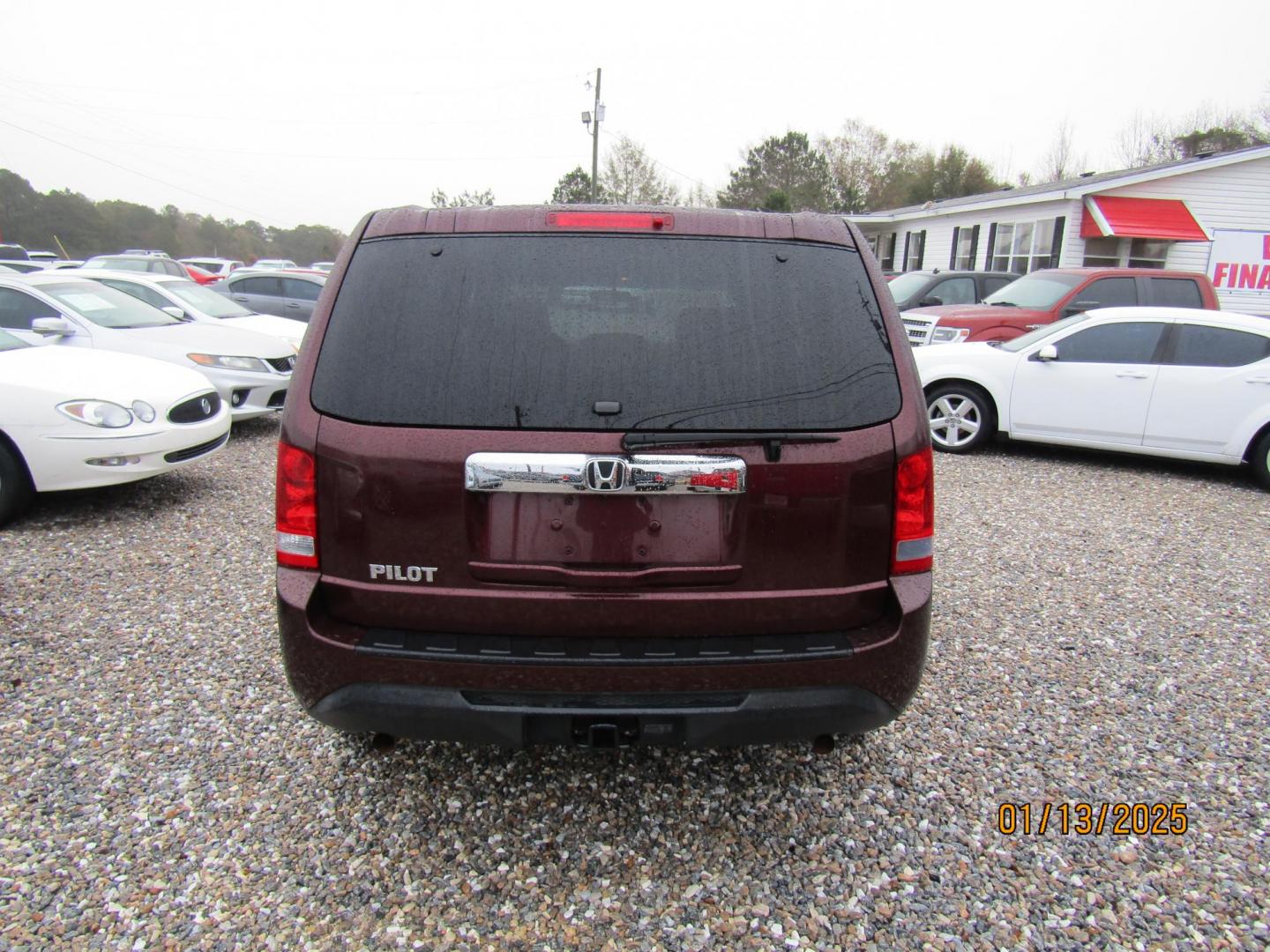 2013 Burgandy Honda Pilot LX 2WD 5-Spd AT (5FNYF3H23DB) with an 3.5L V6 SOHC 24V engine, Automatic transmission, located at 15016 S Hwy 231, Midland City, AL, 36350, (334) 983-3001, 31.306210, -85.495277 - Photo#7