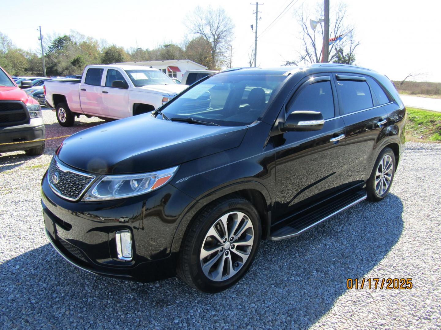 2014 Black Kia Sorento SX V6 FWD (5XYKW4A74EG) with an 3.3L V6 DOHC 24V engine, Automatic transmission, located at 15016 S Hwy 231, Midland City, AL, 36350, (334) 983-3001, 31.306210, -85.495277 - Photo#2