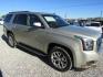 2016 Silver GMC Yukon SLT 2WD (1GKS1BKC7GR) with an 5.3L V8 OHV 16V engine, Automatic transmission, located at 15016 S Hwy 231, Midland City, AL, 36350, (334) 983-3001, 31.306210, -85.495277 - Photo#0