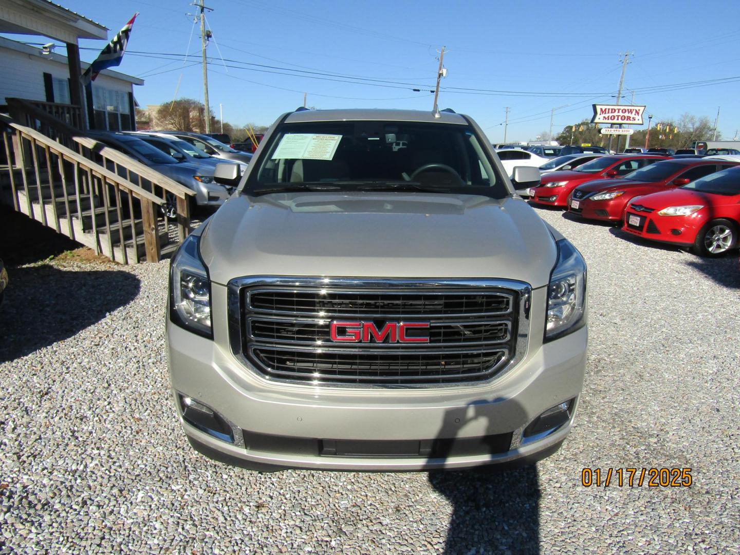 2016 Silver GMC Yukon SLT 2WD (1GKS1BKC7GR) with an 5.3L V8 OHV 16V engine, Automatic transmission, located at 15016 S Hwy 231, Midland City, AL, 36350, (334) 983-3001, 31.306210, -85.495277 - Photo#1