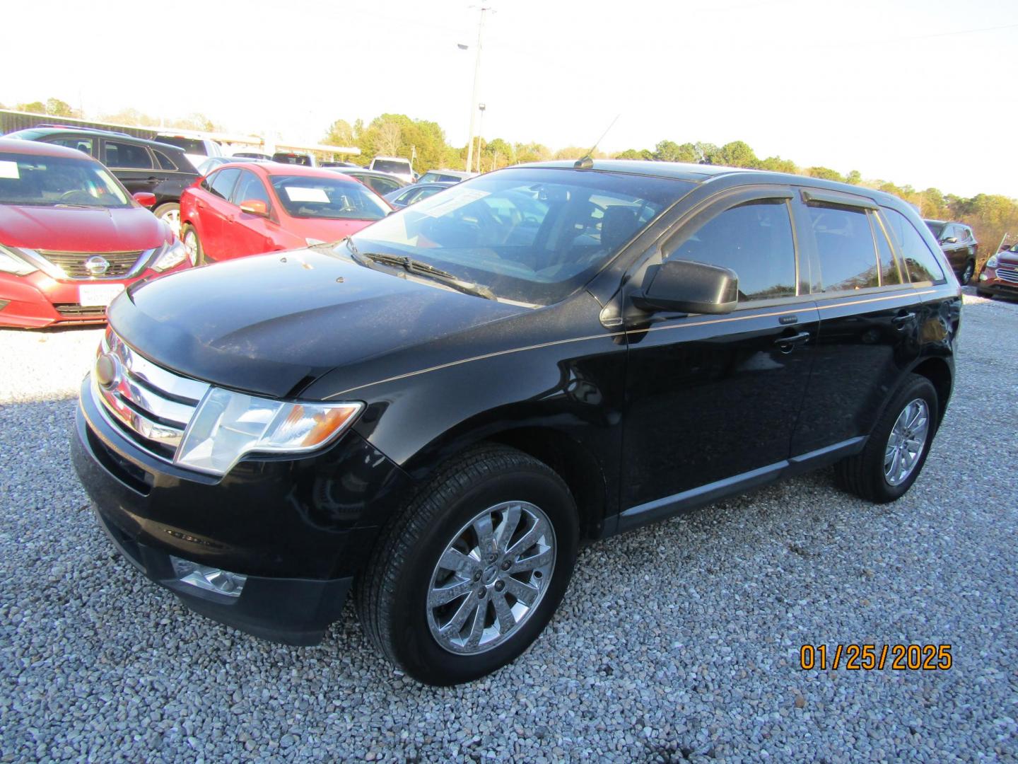 2010 Black Ford Edge SEL FWD (2FMDK3JC9AB) with an 3.5L V6 DOHC 24V engine, Automatic transmission, located at 15016 S Hwy 231, Midland City, AL, 36350, (334) 983-3001, 31.306210, -85.495277 - Photo#2