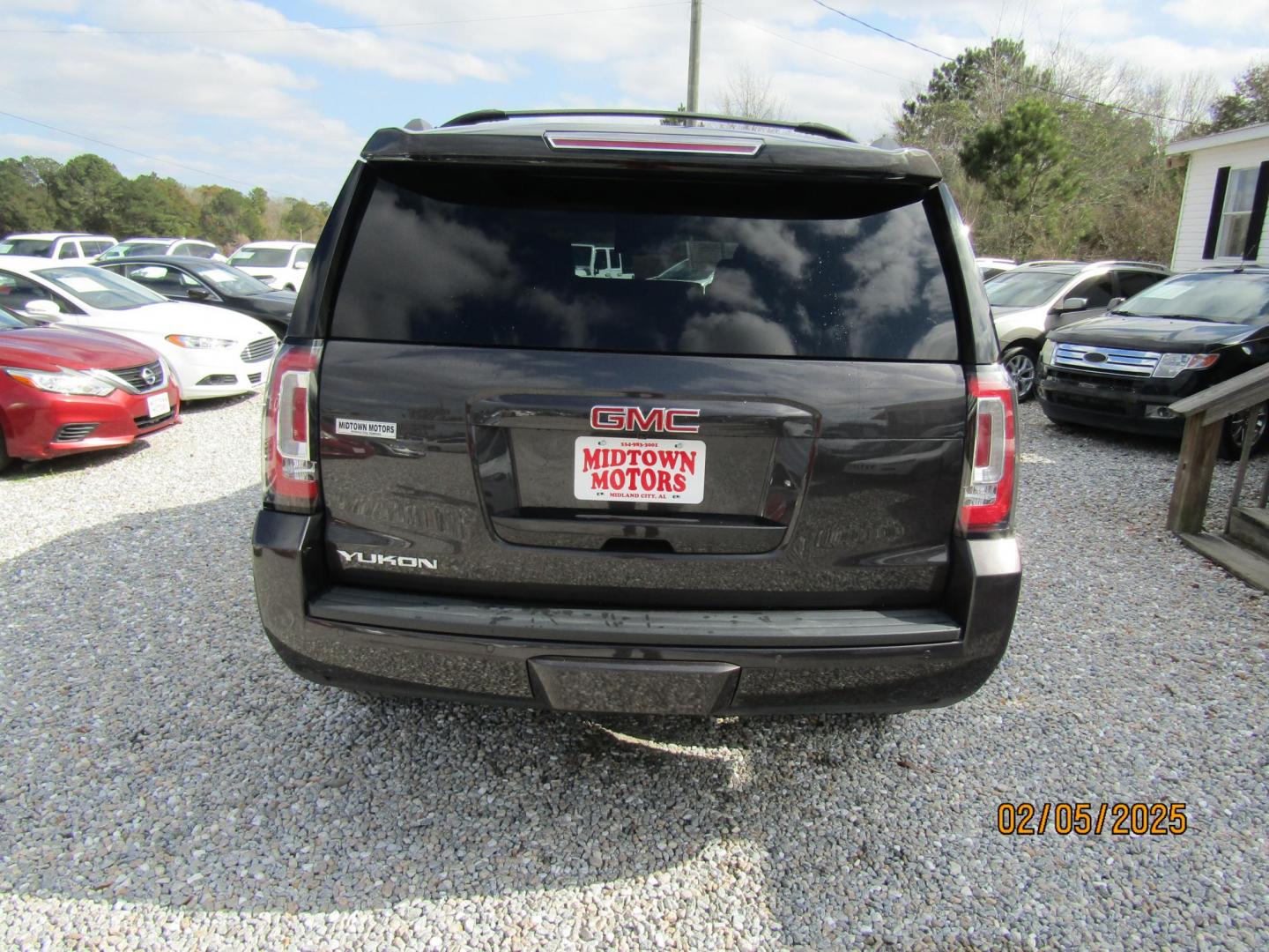 2016 Dark Gray GMC Yukon SLT 2WD (1GKS1BKC3GR) with an 5.3L V8 OHV 16V engine, Automatic transmission, located at 15016 S Hwy 231, Midland City, AL, 36350, (334) 983-3001, 31.306210, -85.495277 - Photo#7