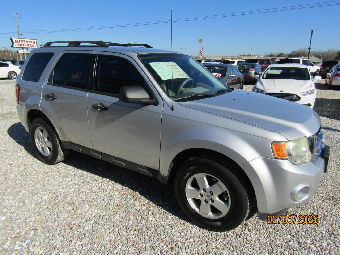 2011 Silver Ford Escape XLS FWD (1FMCU0C75BK) with an 2.5L L4 DOHC 16V engine, Automatic transmission, located at 15016 S Hwy 231, Midland City, AL, 36350, (334) 983-3001, 31.306210, -85.495277 - Photo#0